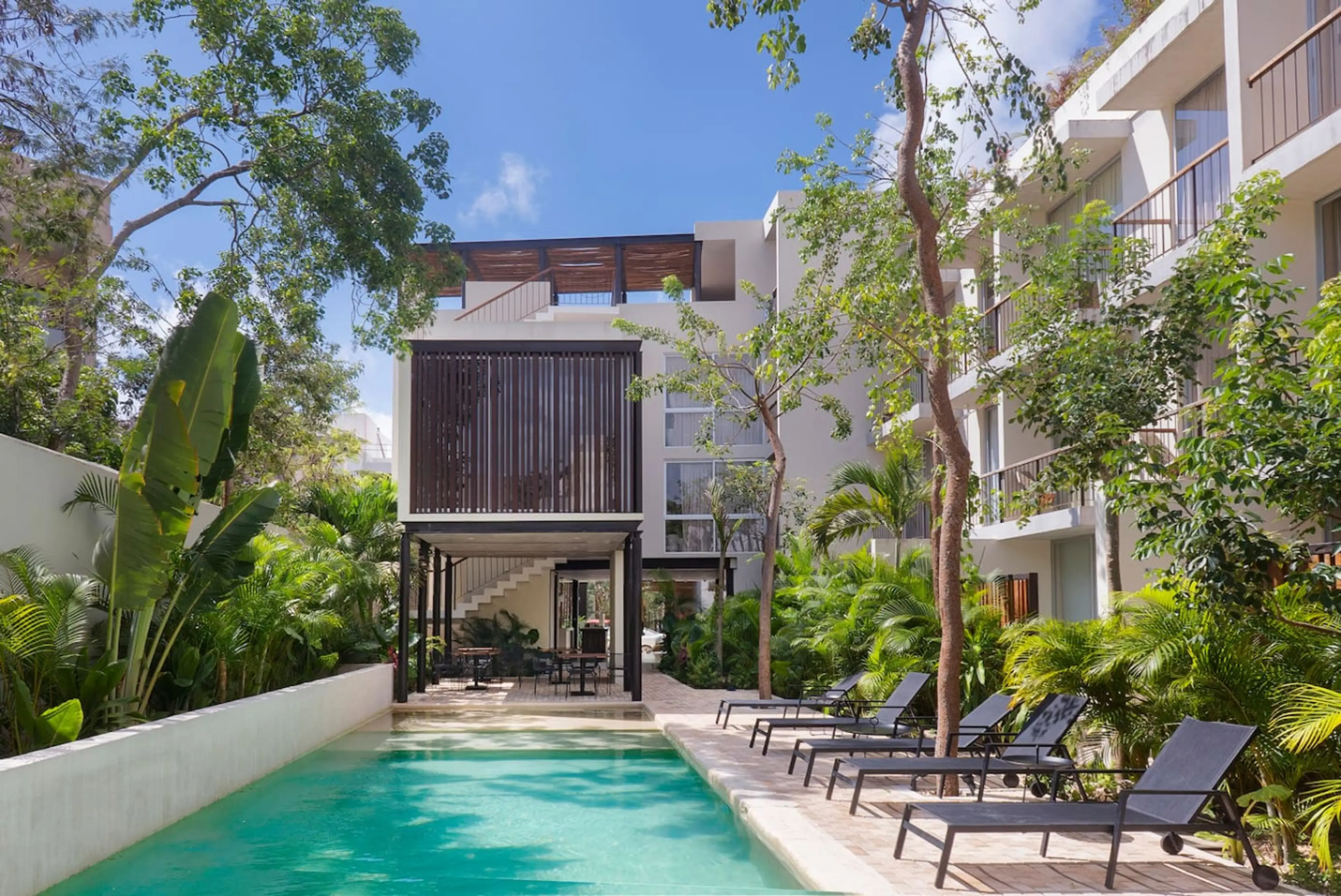 Experience pure relaxation in our spacious pool area, where cozy hammocks and refreshing waters create the perfect setting to unwind!