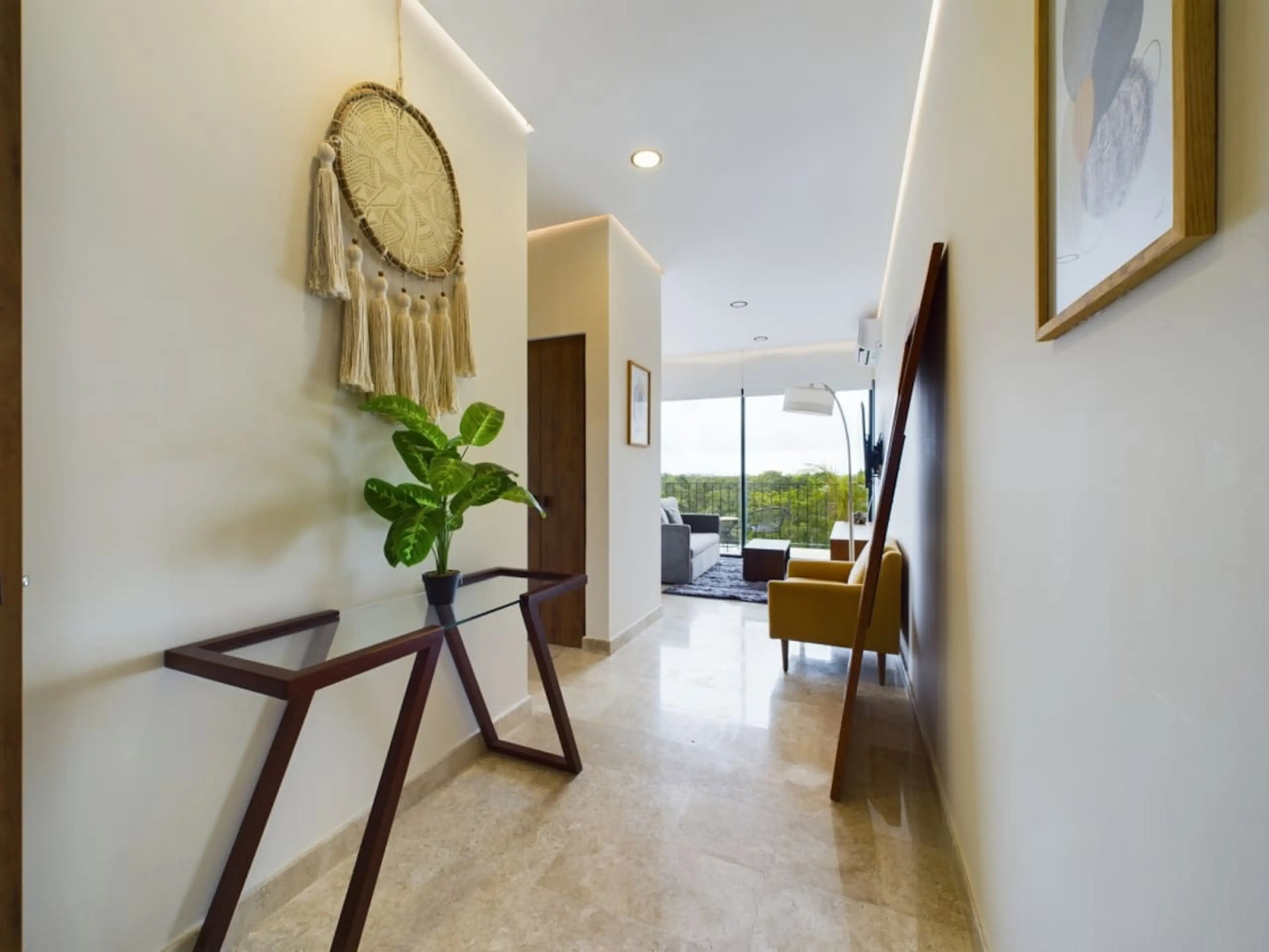 Unwind in our stylish living room, where cozy vibes, plenty of space, and expansive sky views create the perfect place to relax."