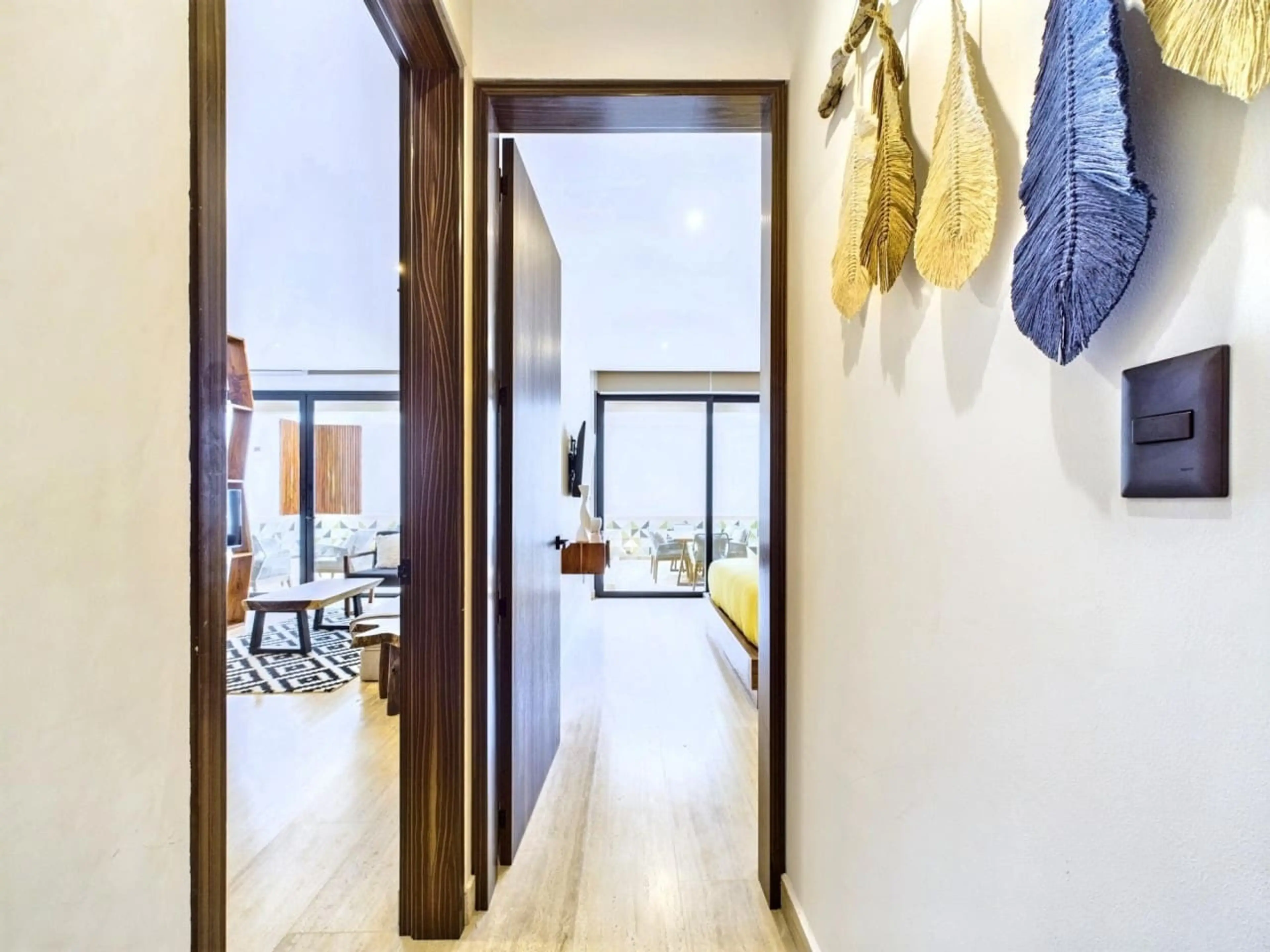 As you enter, you'll be greeted by abundant natural light and ample space. To the right, you'll find the master bedroom with its private bathroom, and to the left, the second master bedroom with a spacious living area. Everything is brand new and thoughtf