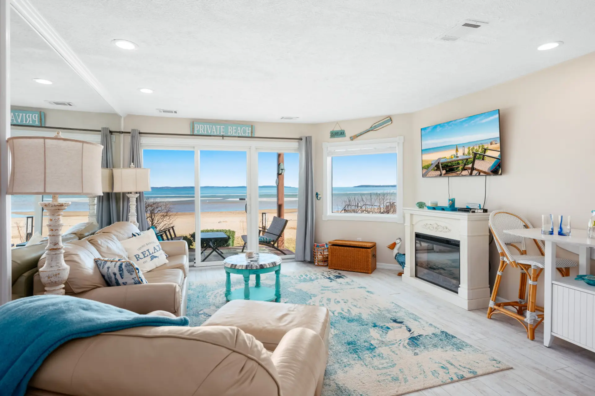 Soak in the sun and the sea breeze from this serene coastal living room. 🌊☀️