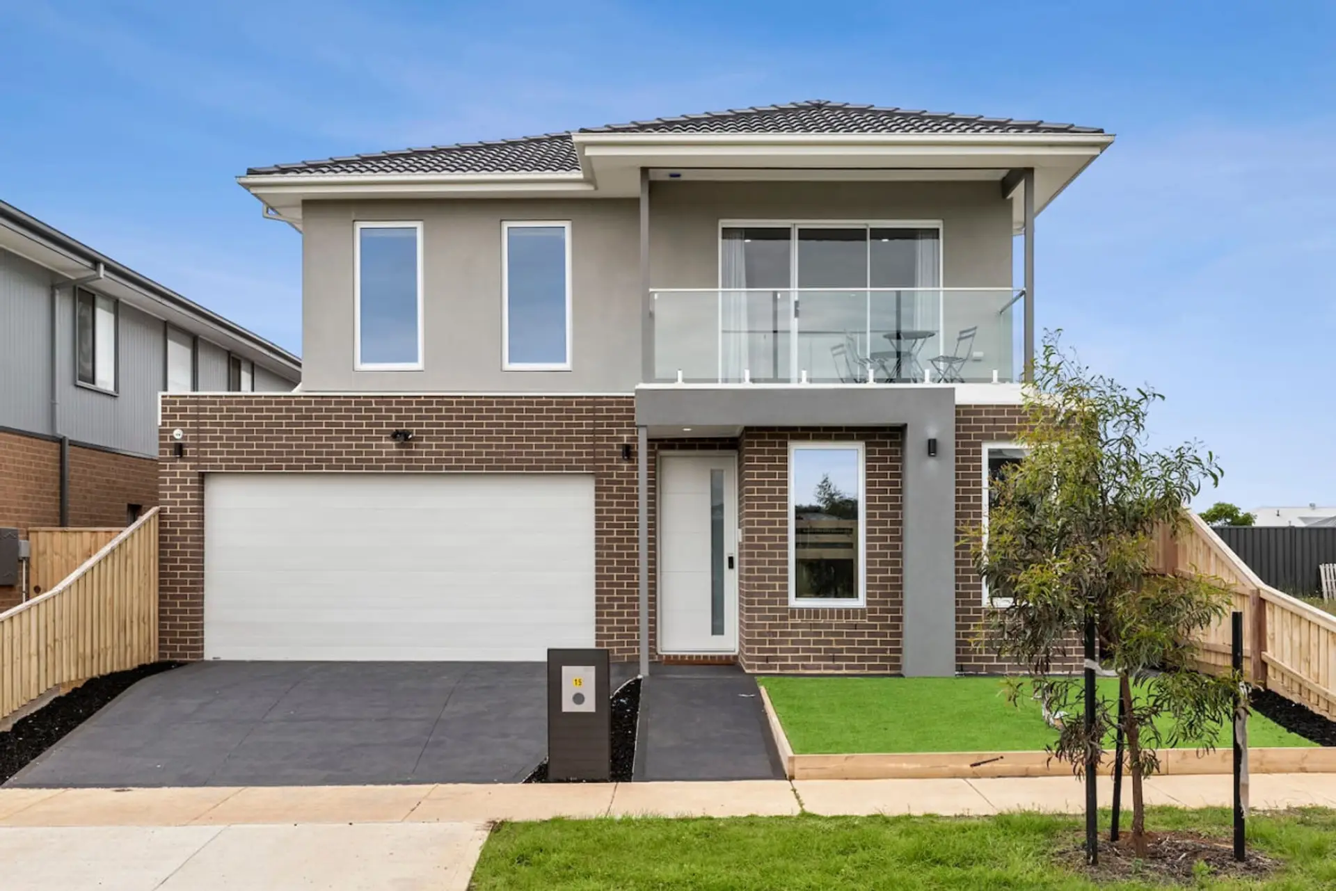 This modern double-story home features a sleek facade, private balcony, double garage, and stylish interiors — perfect for families or friends seeking space, comfort, and contemporary design