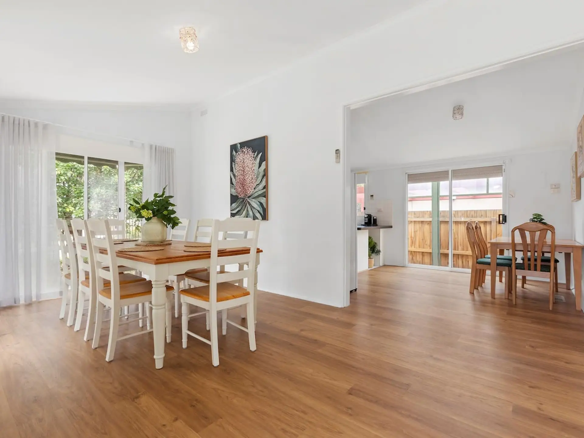 Enter into the light filled dining area & kitchen