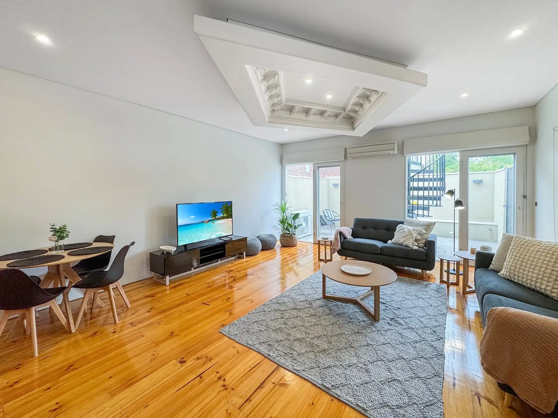 Great sized living with quality furniture & polished flooring