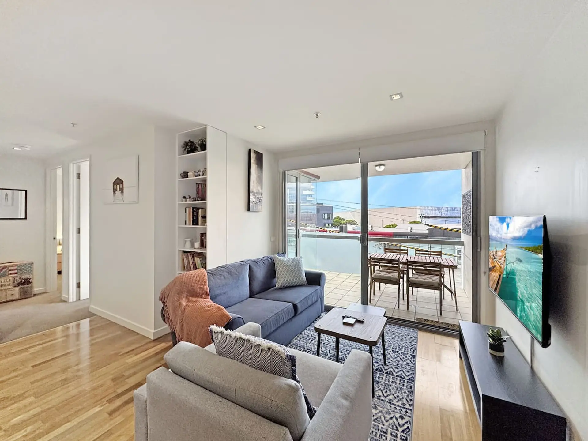 Light-filled living area opening onto a private balcony just minutes from the Geelong Waterfront and Train Station