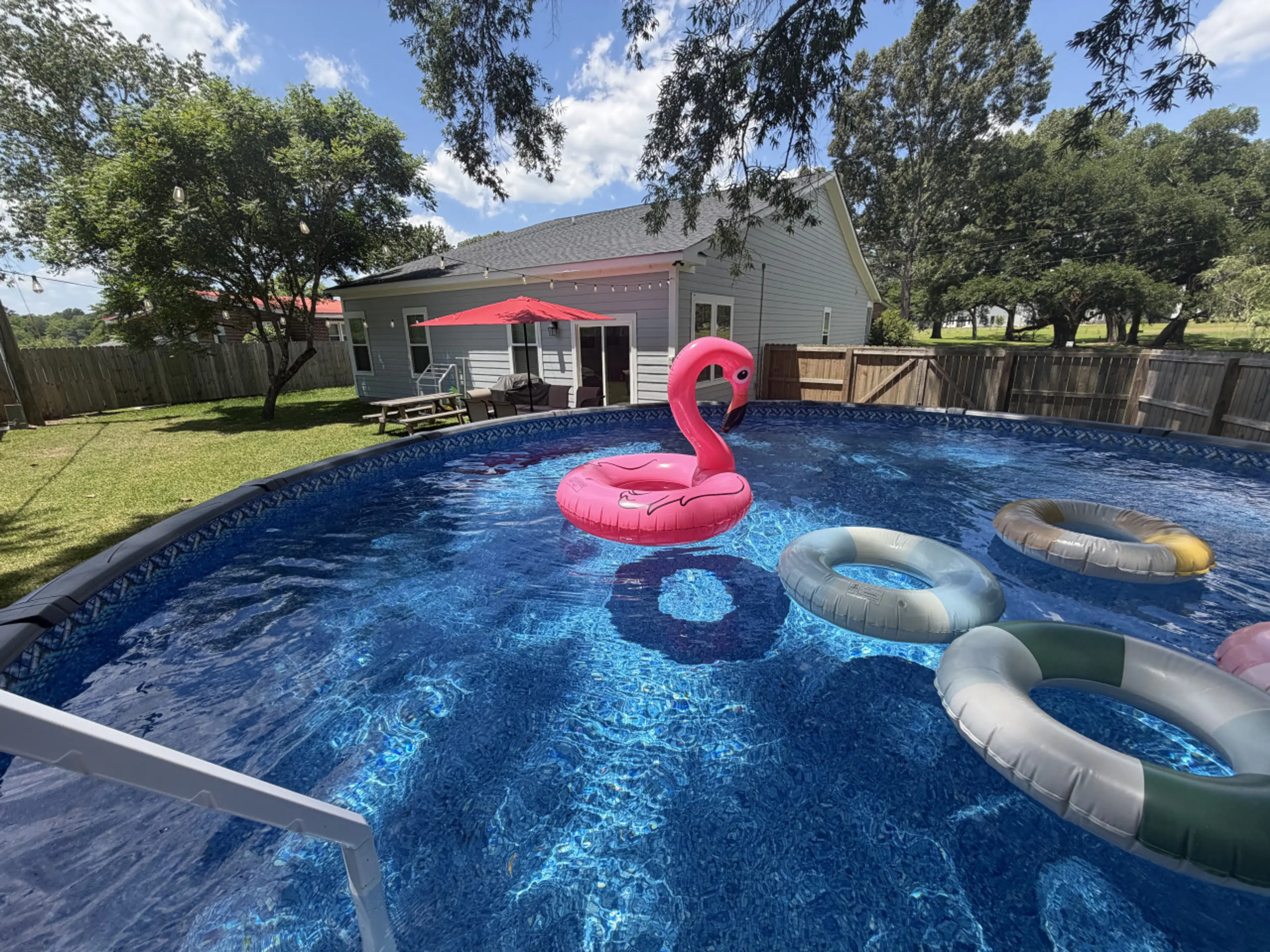 Claim your spot in the private pool — float the afternoon away while the kids cannonball and someone fires up the grill nearby.