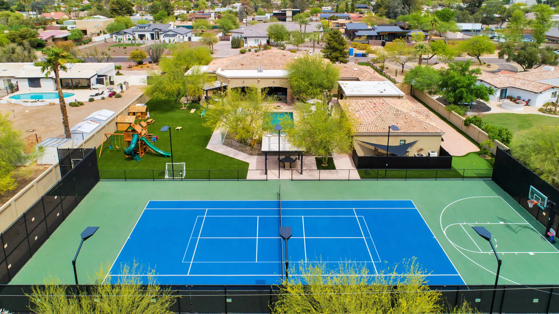 [Resort Property] Backyard heated pool and spa with gas fire pit, playgrounds, tennis, pickleball and basketball court