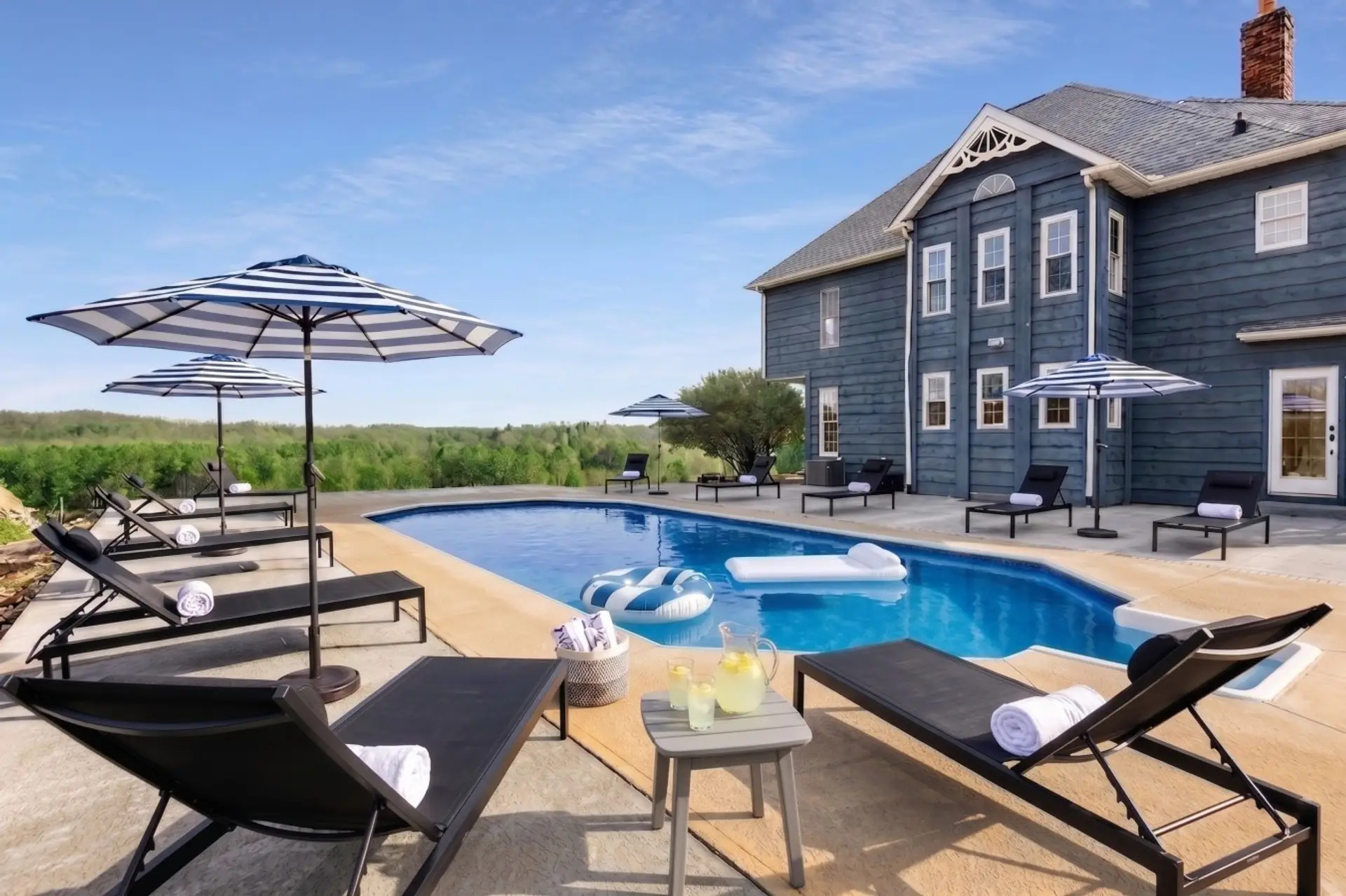 [Heated Pool] Great views with sun loungers to relax, Safety fence with gate not pictured.