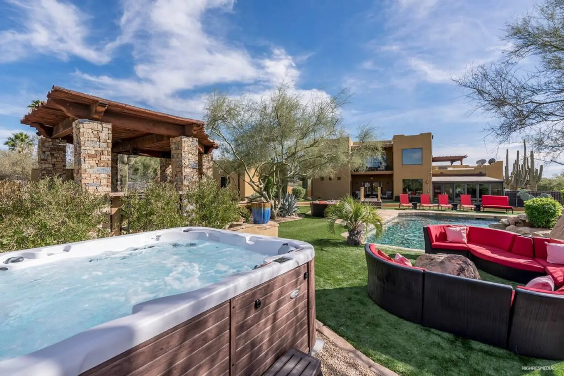 [Backyard] Fully grassed with plenty of spots for lounging in the sun or hot tub