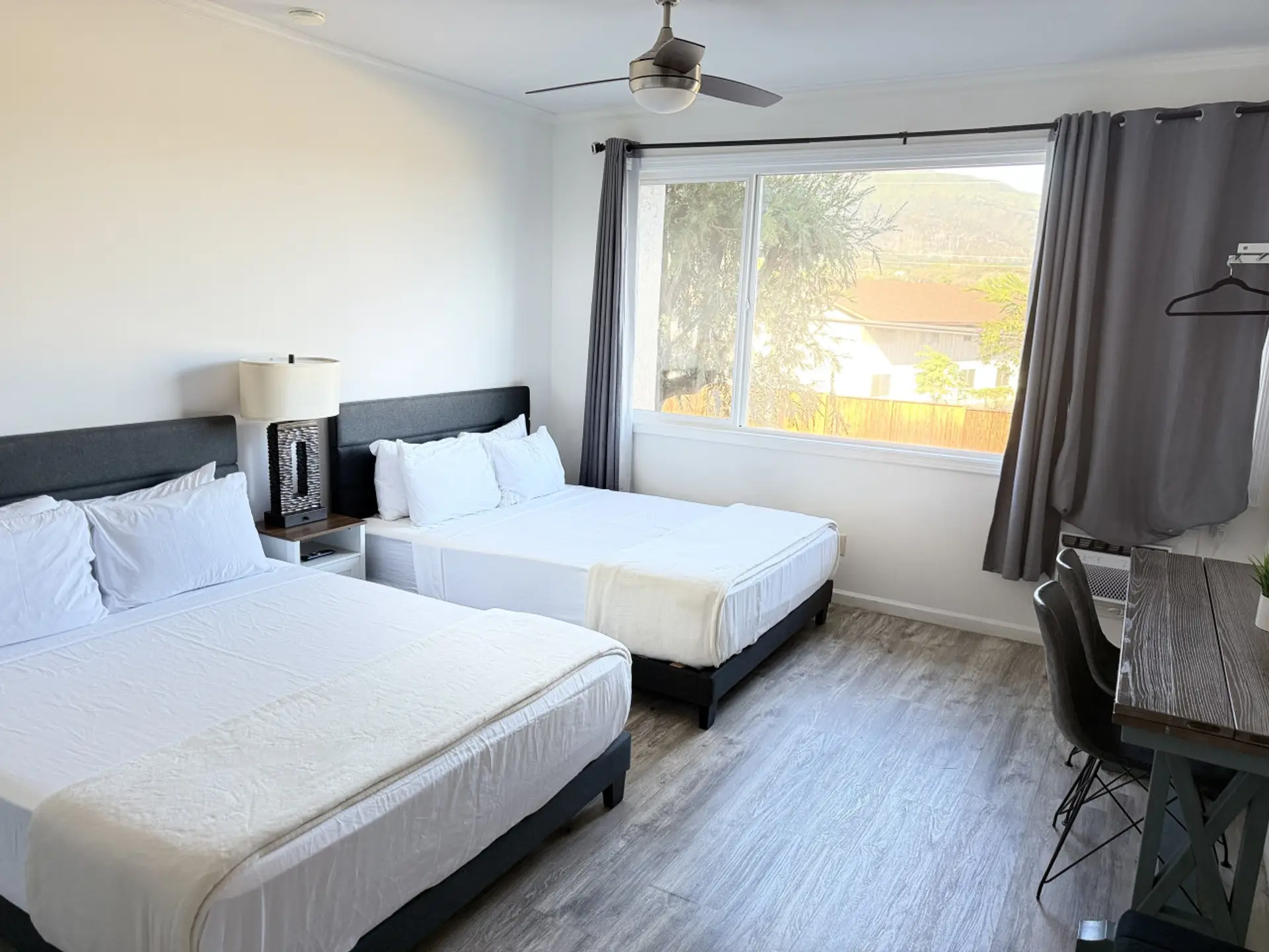 Two queen beds with cooling, medium-firm mattresses—designed for comfort, support, and restful sleep
