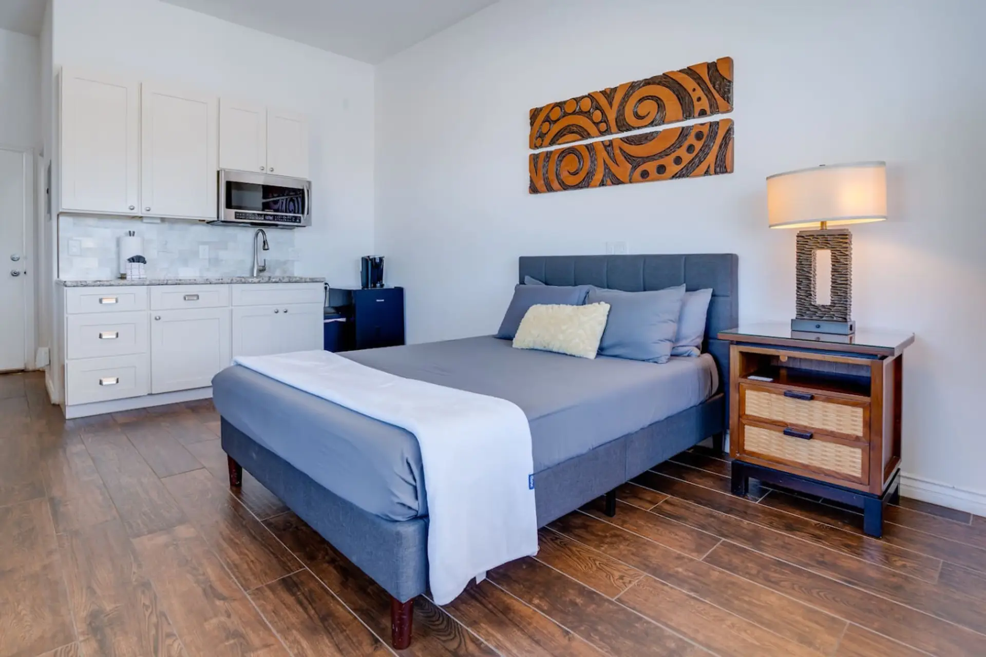 Second floor corner Studio with a Queen Bed and twin bed comfortably sleeps 3 guest