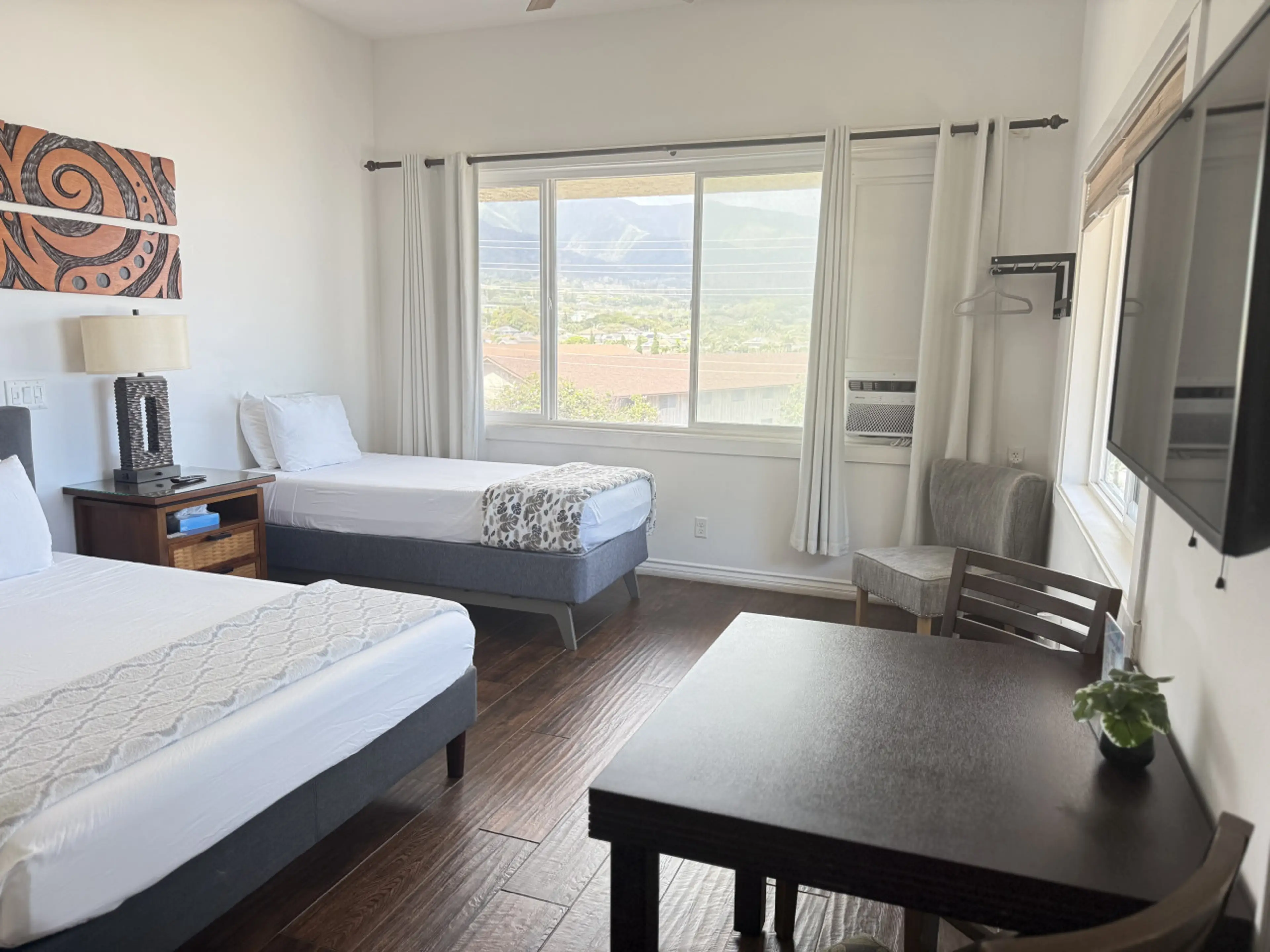 Second floor corner Studio with a Queen Bed and twin bed comfortably sleeps 3 guest