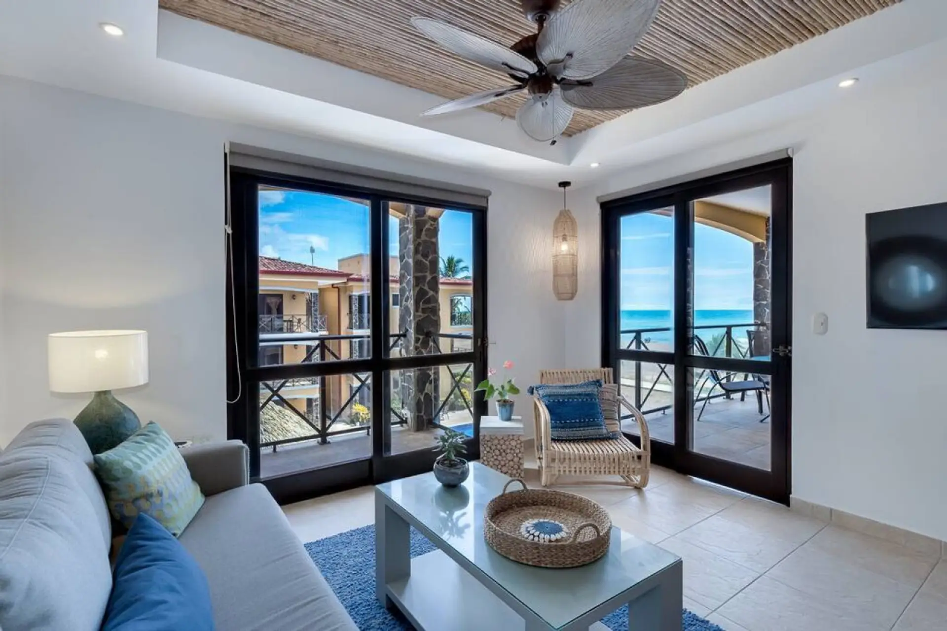 Our Living Room, recently updated with Bamboo ceiling inlays, ceiling fan and Smart TV.  And, of course, more views.