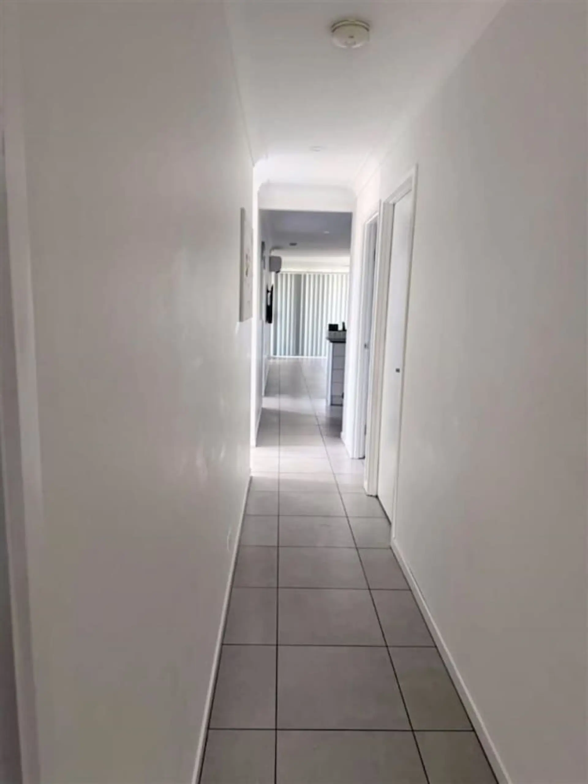 Tidy hallway to laundry