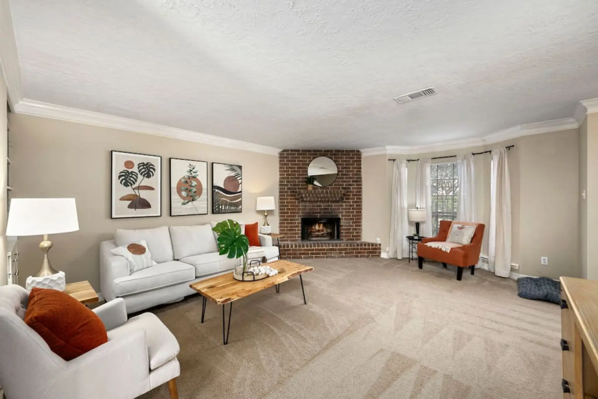 Bright living room with cozy seating, fireplace, and Smart TV — perfect for relaxing after exploring Montrose