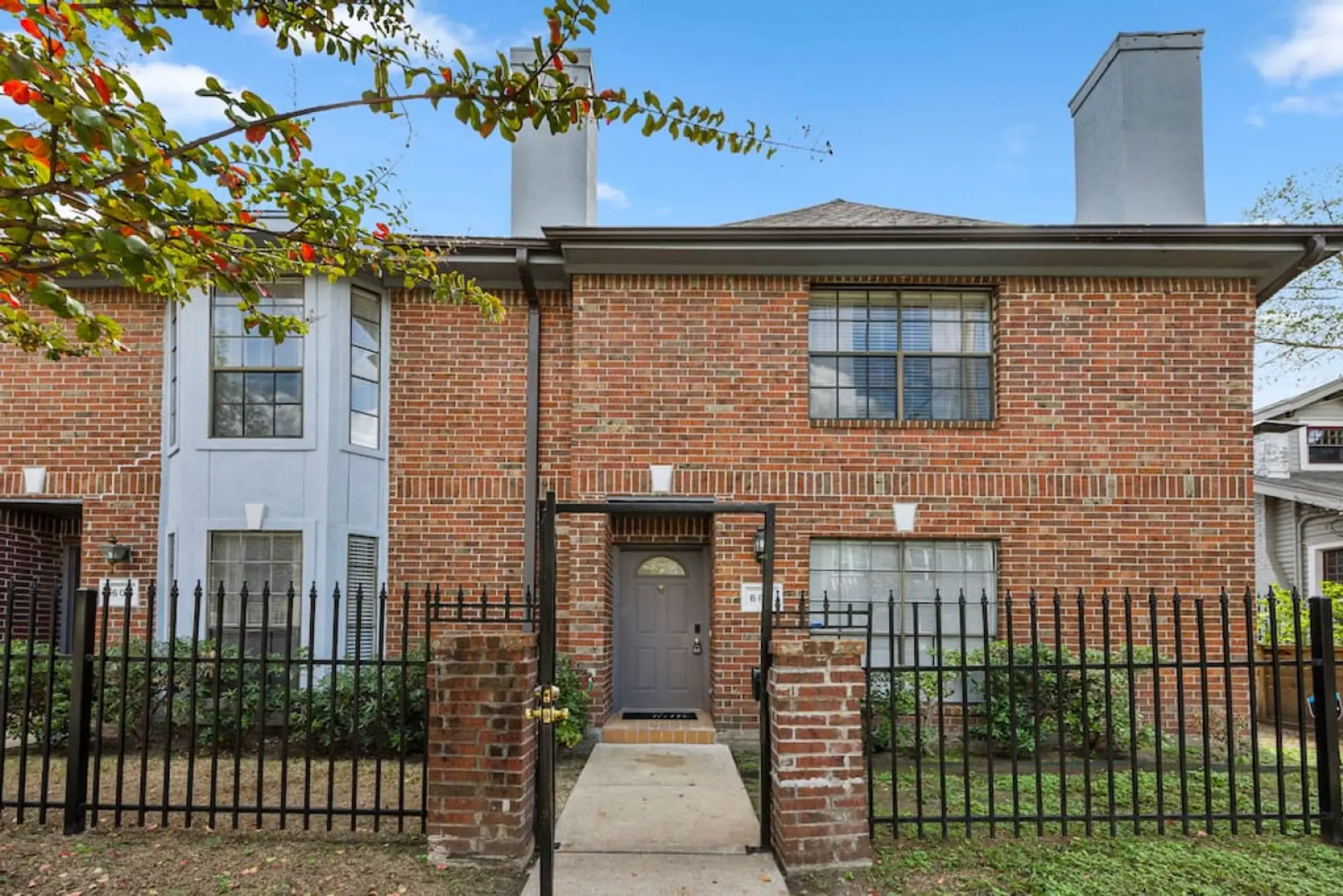 Front exterior of the townhomes with sidewalk access to both private entrances