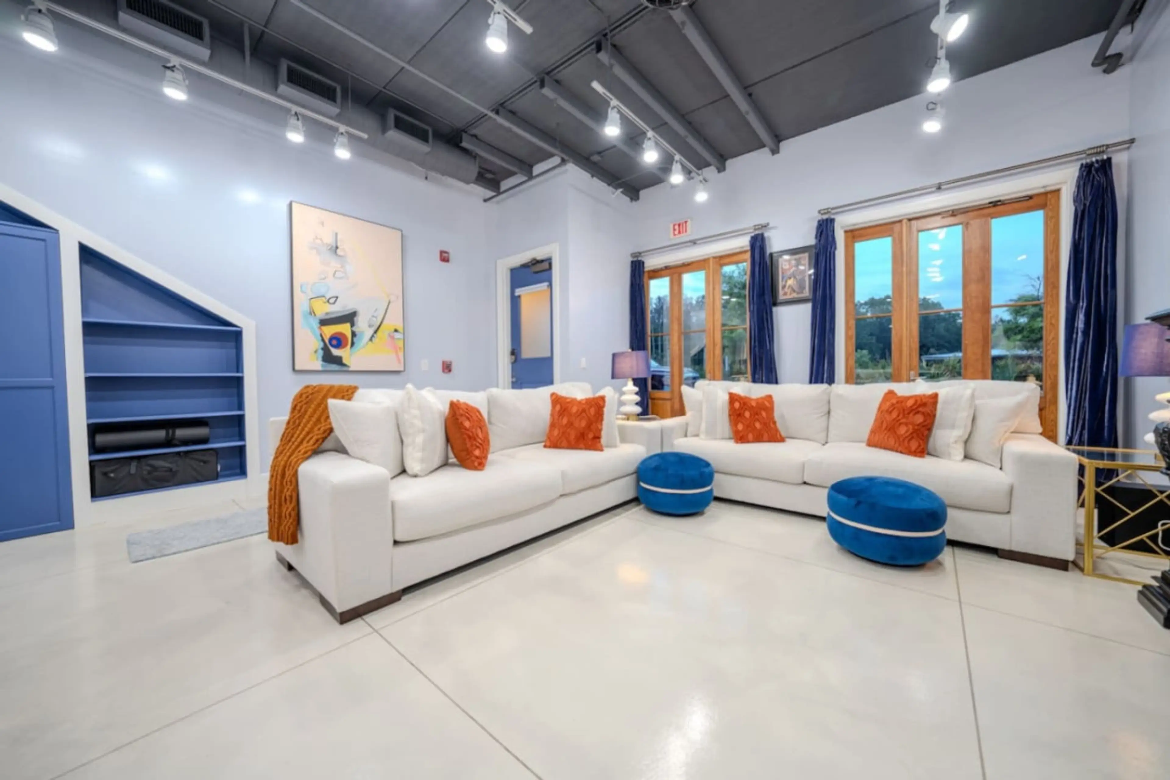 Beautifully decorated living room, with plenty of seating and a designated workspace if you’re traveling for work. 75” Roku TV (must log into your own accounts), fully stocked kitchen with large island and four barstools.