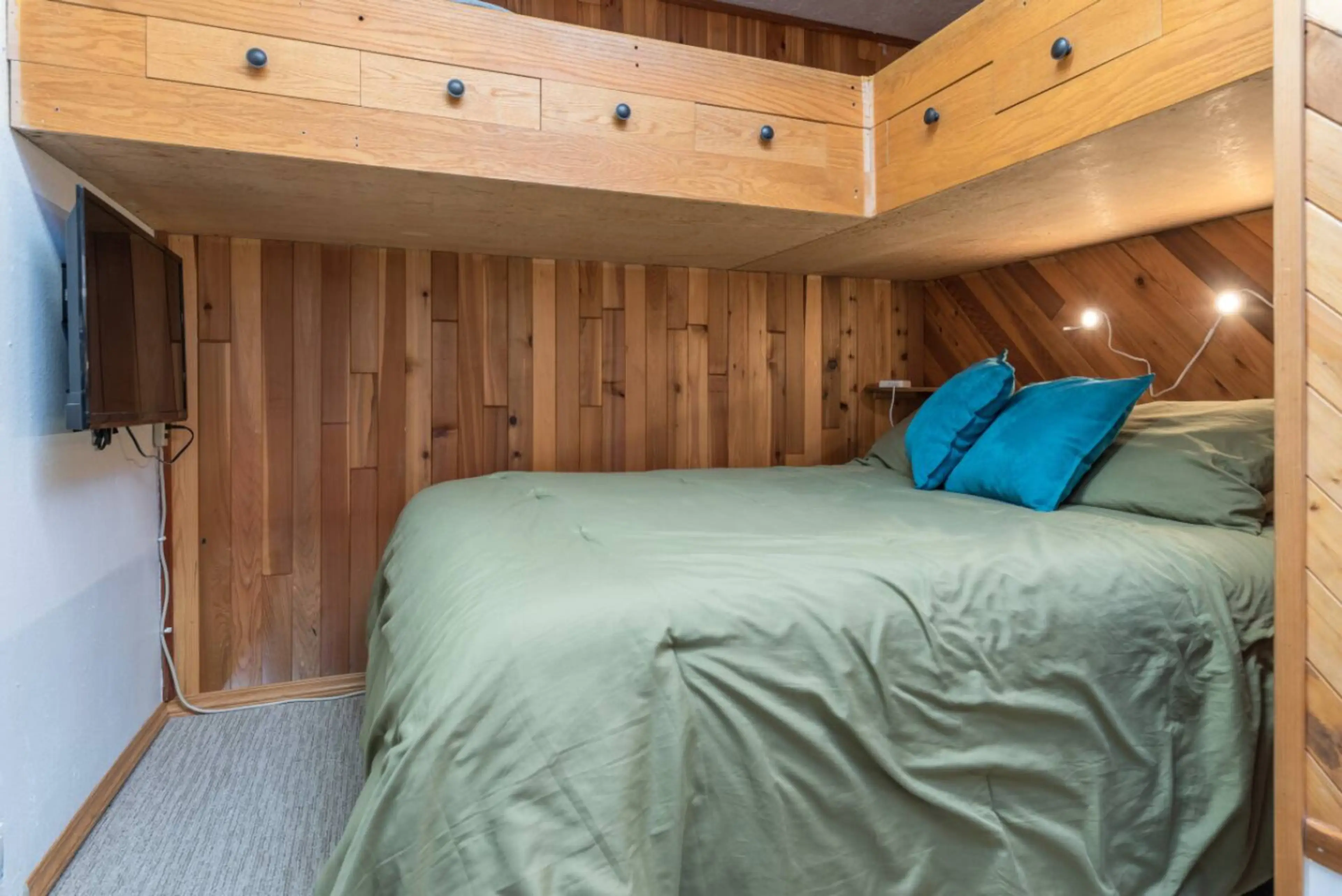 Queen private bedroom w/ Roku TV. Leading to back porch (not private). Chairs are provided.