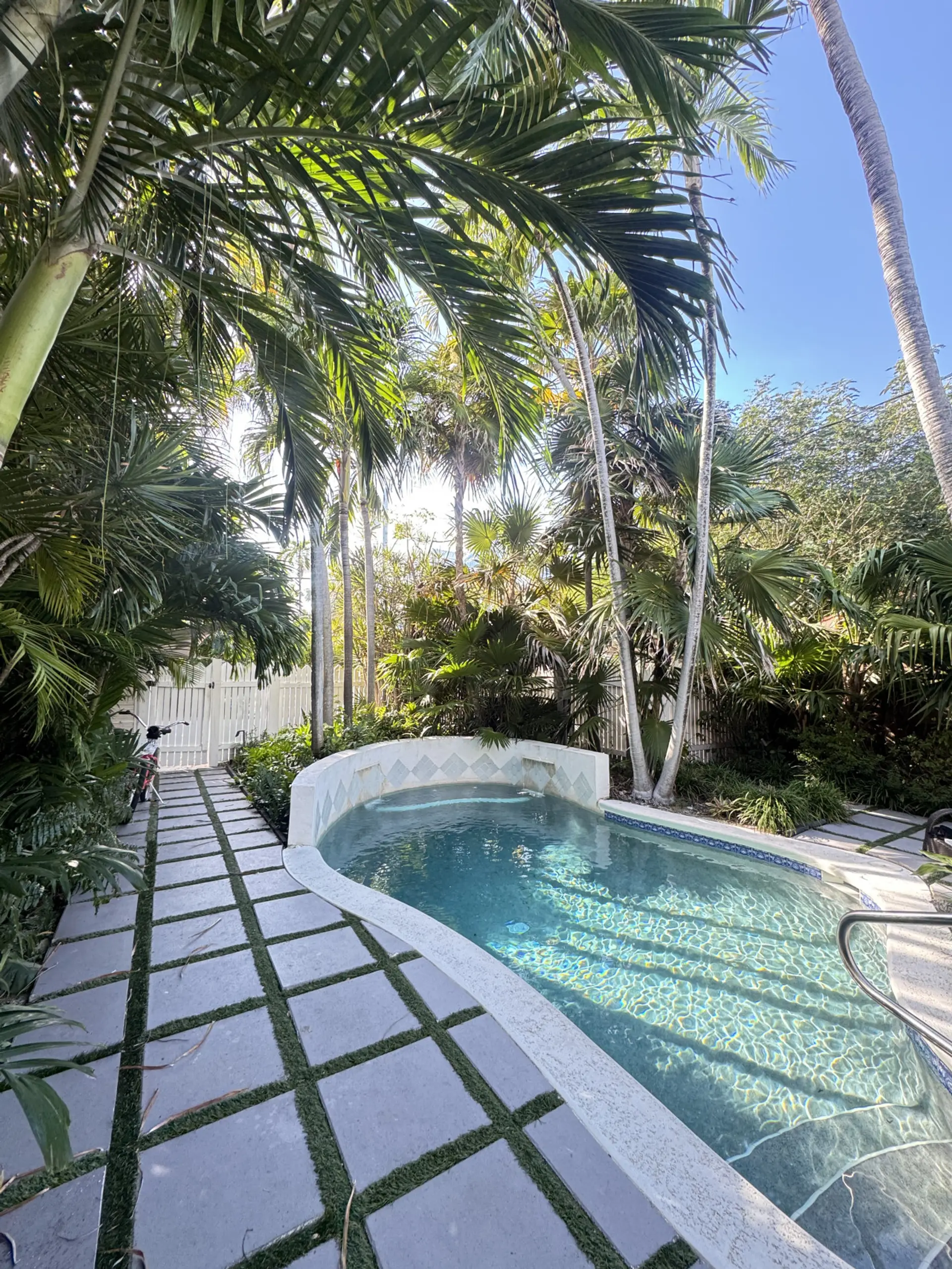 Pool with bench and fountain feature / view from front porch