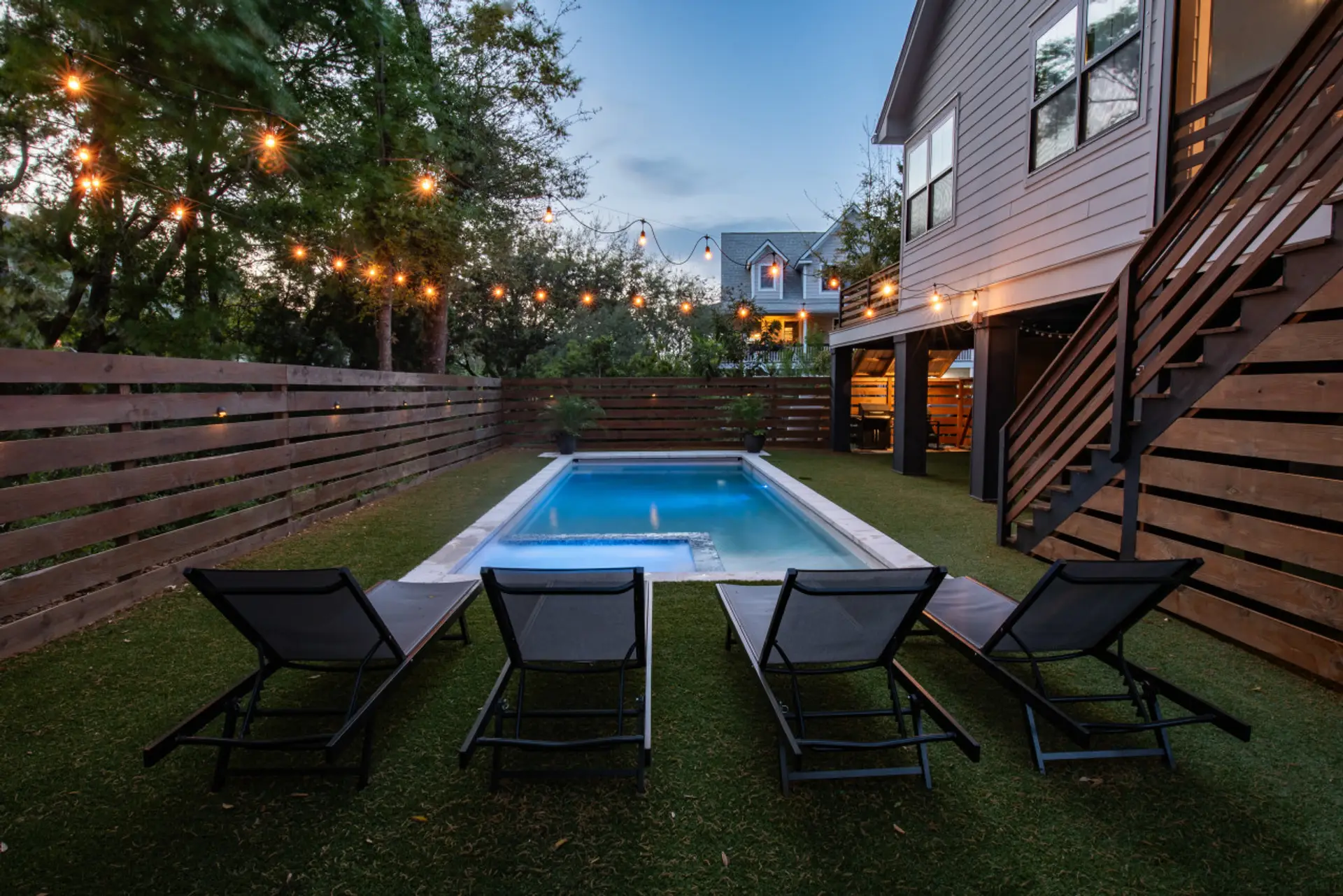 Pool and backyard at night