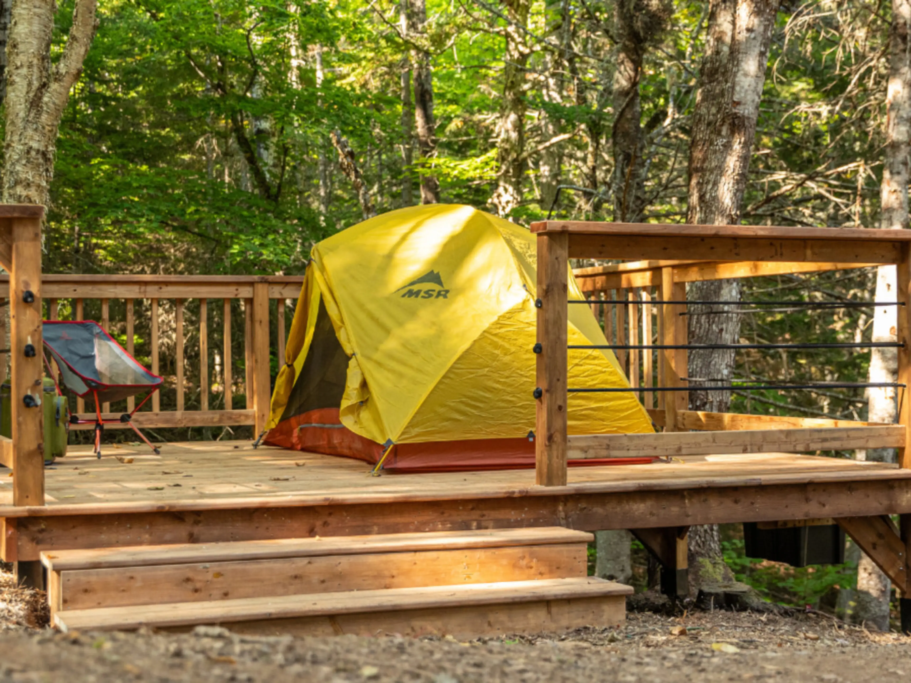 Elevated tent pad with stunning woodland views — a rustic basecamp near the trails of Poley Mountain.