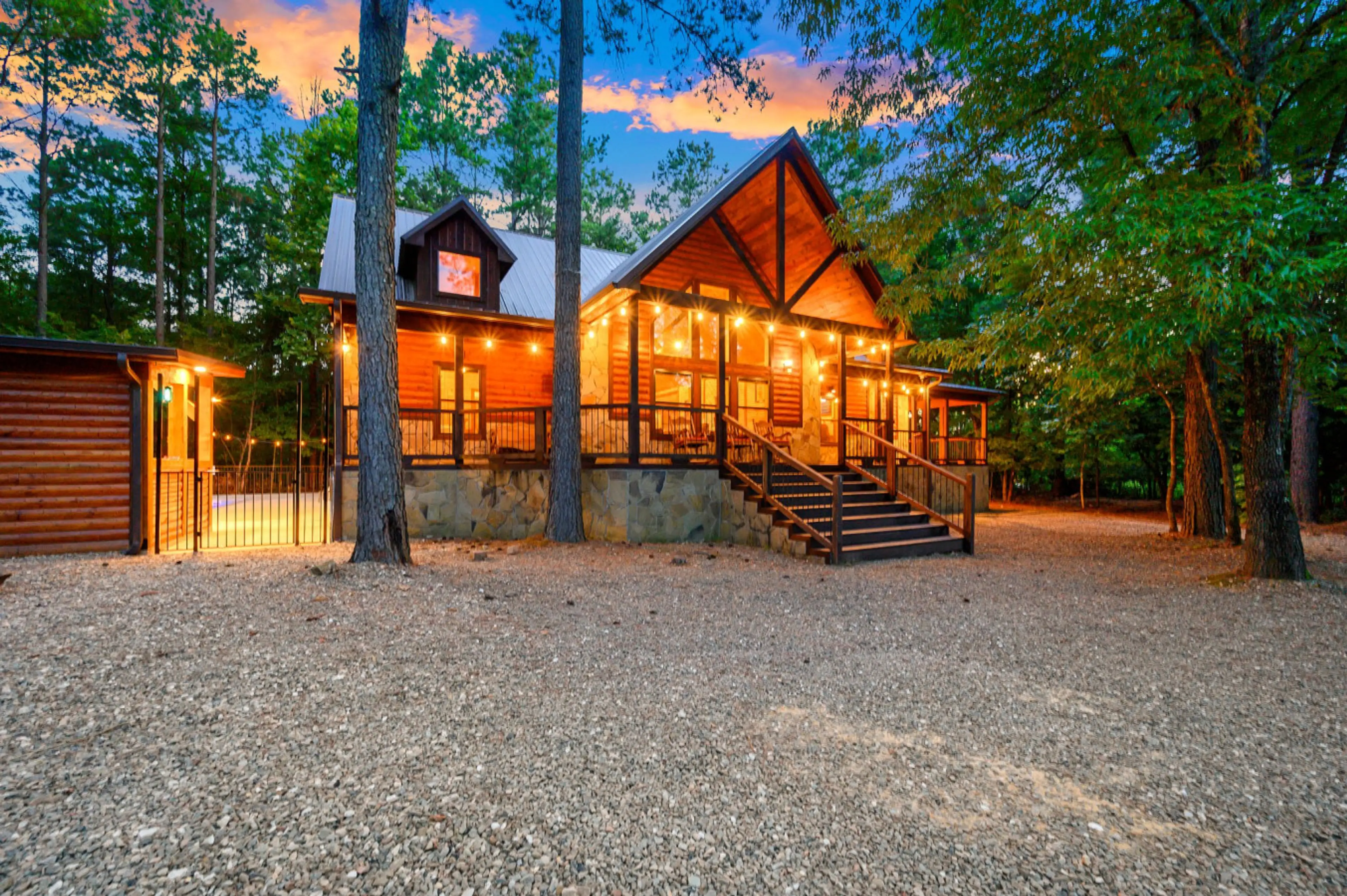 Tucked beneath towering pines, this cabin blends beautifully into its natural surroundings.
