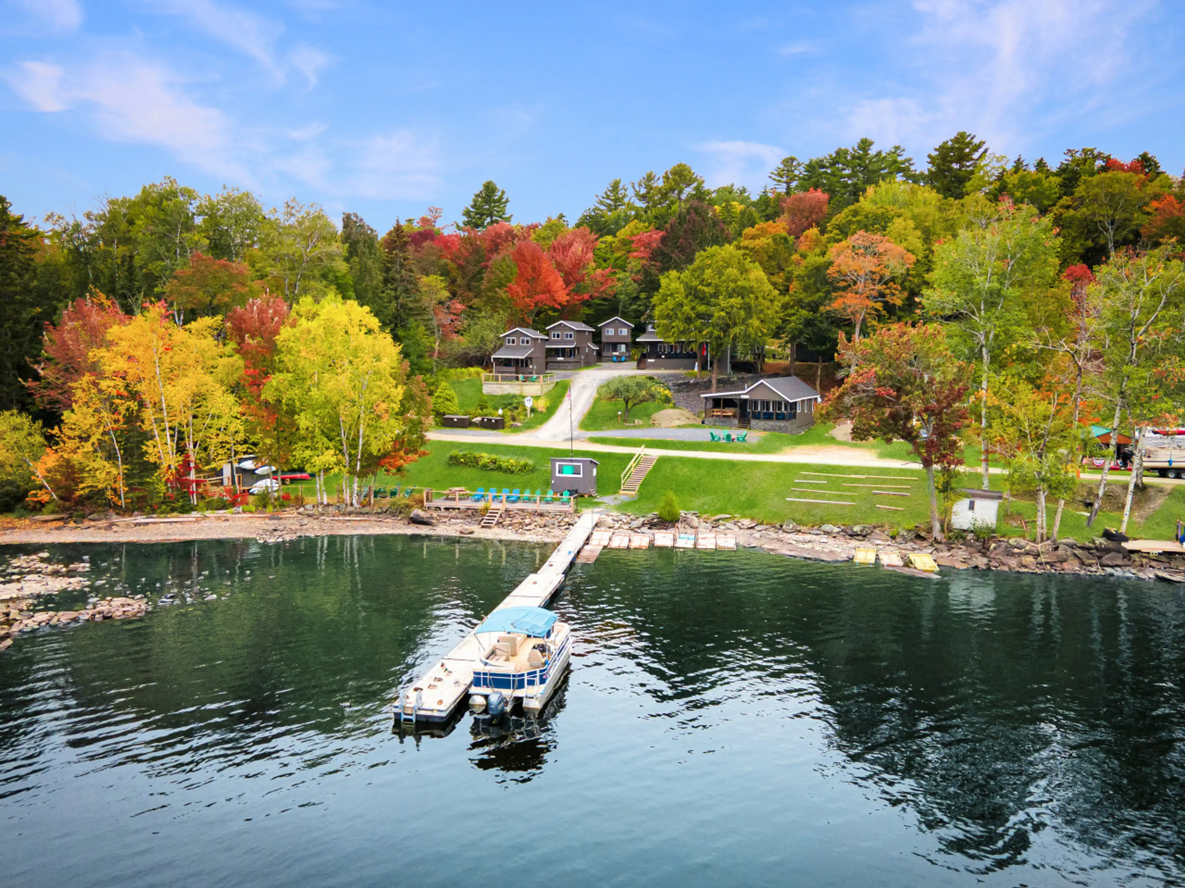 The dock reaches out, the boat waits, and the cabin welcomes.