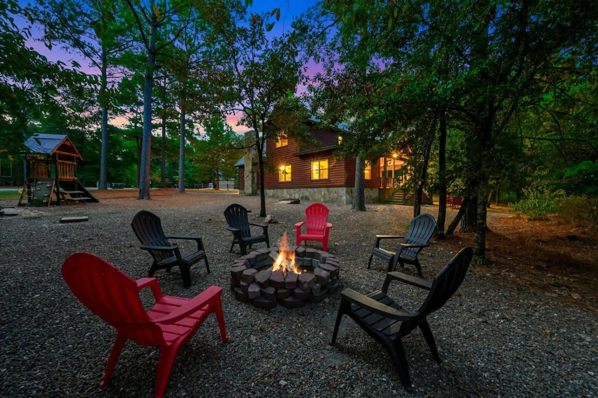 Gather around the fire pit with friends and family in this perfect little clearing—there's something special about stargazing and conversation when you're nestled in the trees like this.