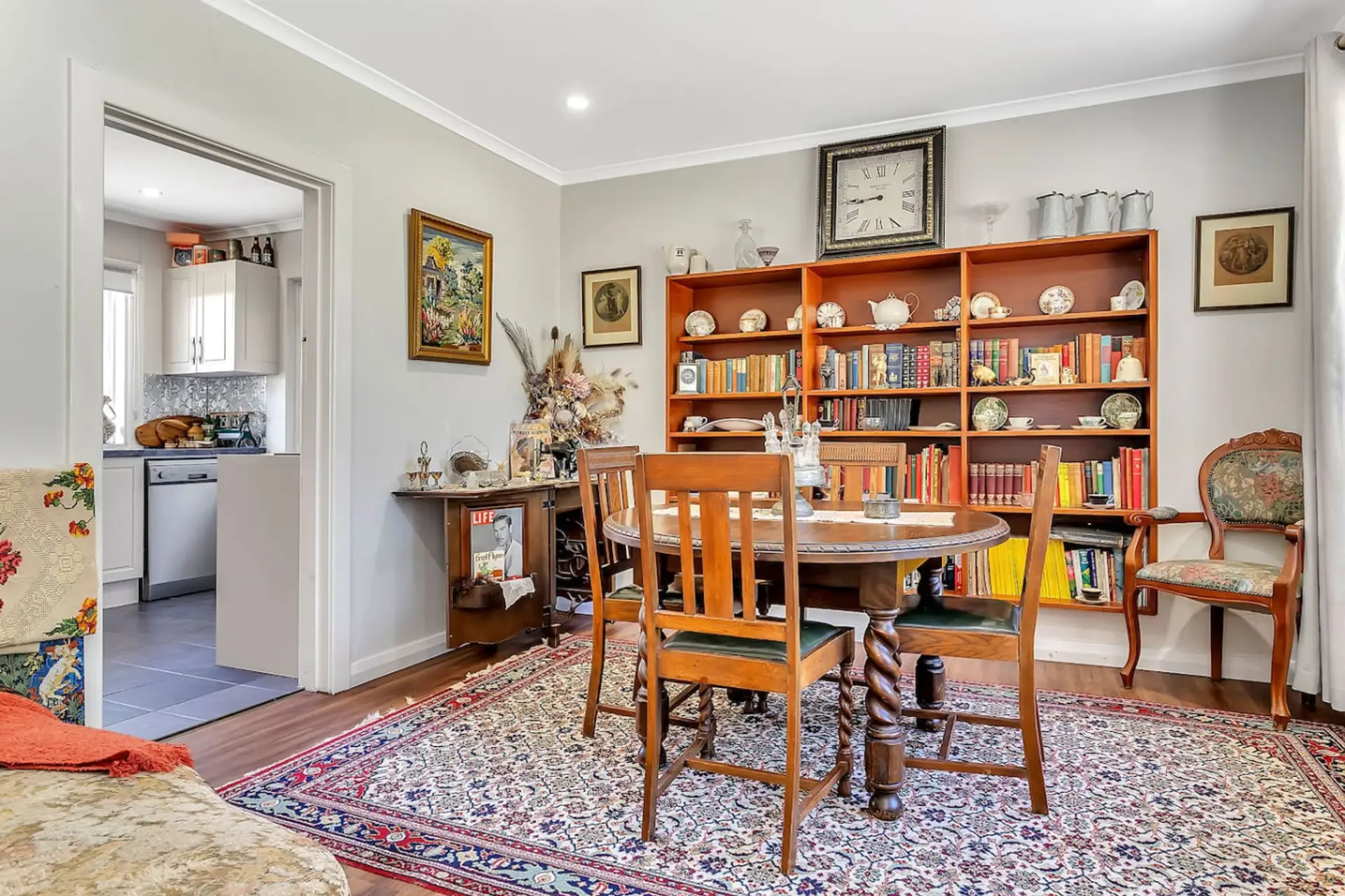 The open dining area flows seamlessly into the kitchen, creating a practical and welcoming space.
