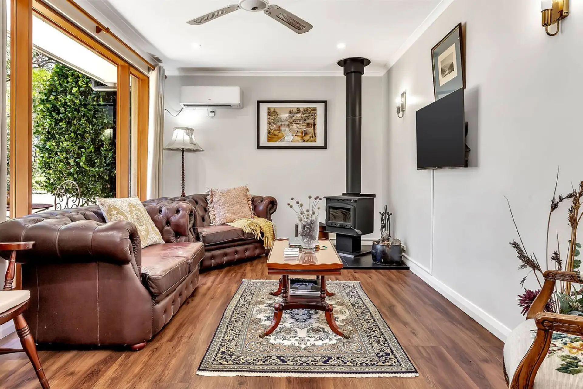 Comfortable living area with natural light and peaceful views.