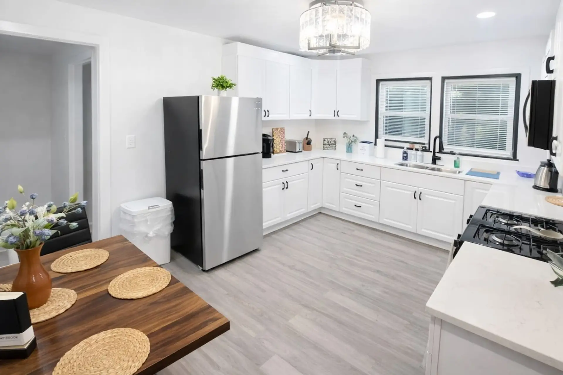 Our fully equipped, modern kitchen offers a spacious and functional layout with ample counter space and all the essential cookware needed to easily prepare home-cooked meals during your extended stay.