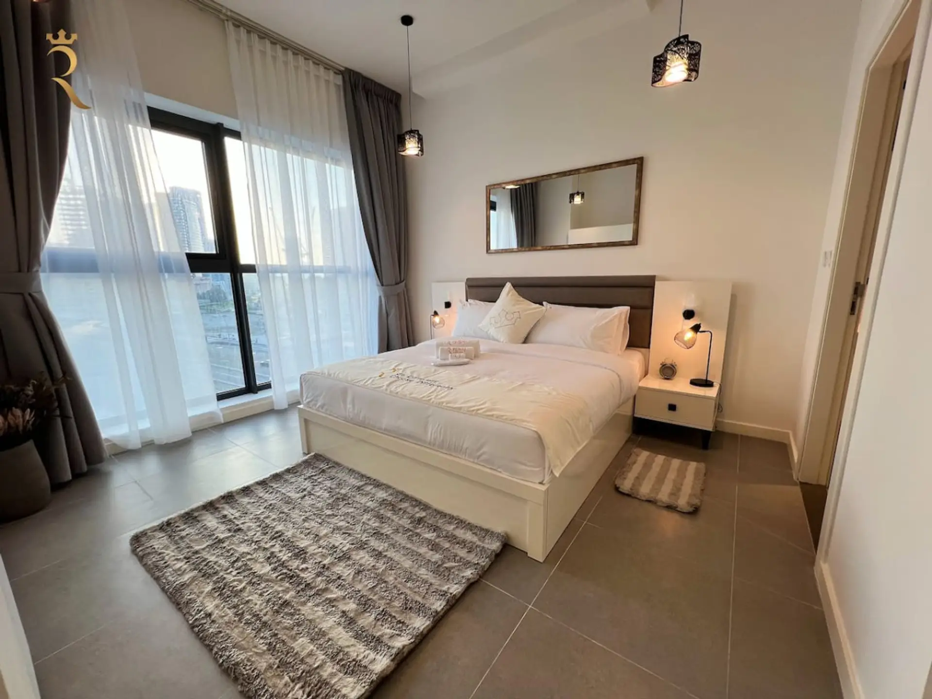Experience the epitome of elegance in our upscale bedroom, where every detail reflects a commitment to refined living.