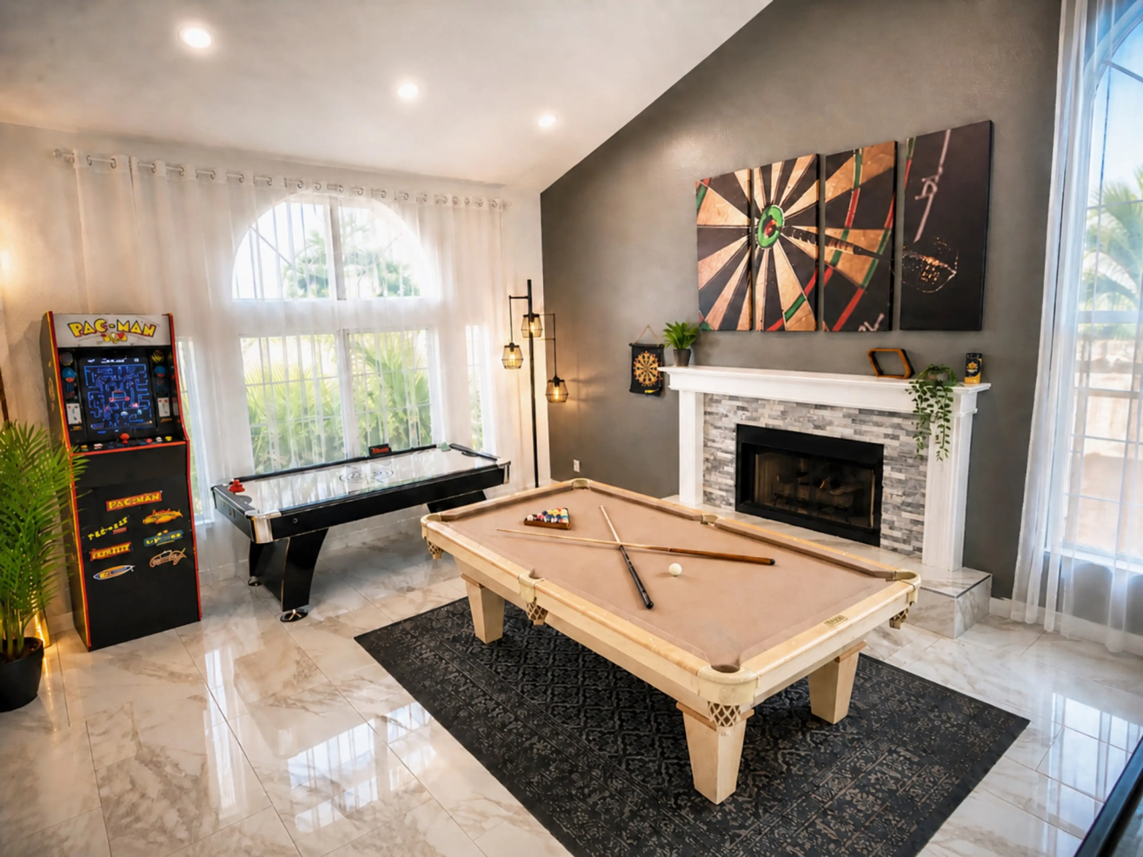 A fully loaded game room made for unforgettable nights - magnetic darts, shuffleboard, pool table, poker chips, arcade fun, and plenty more. Around here, “just one more game” is always the answer.