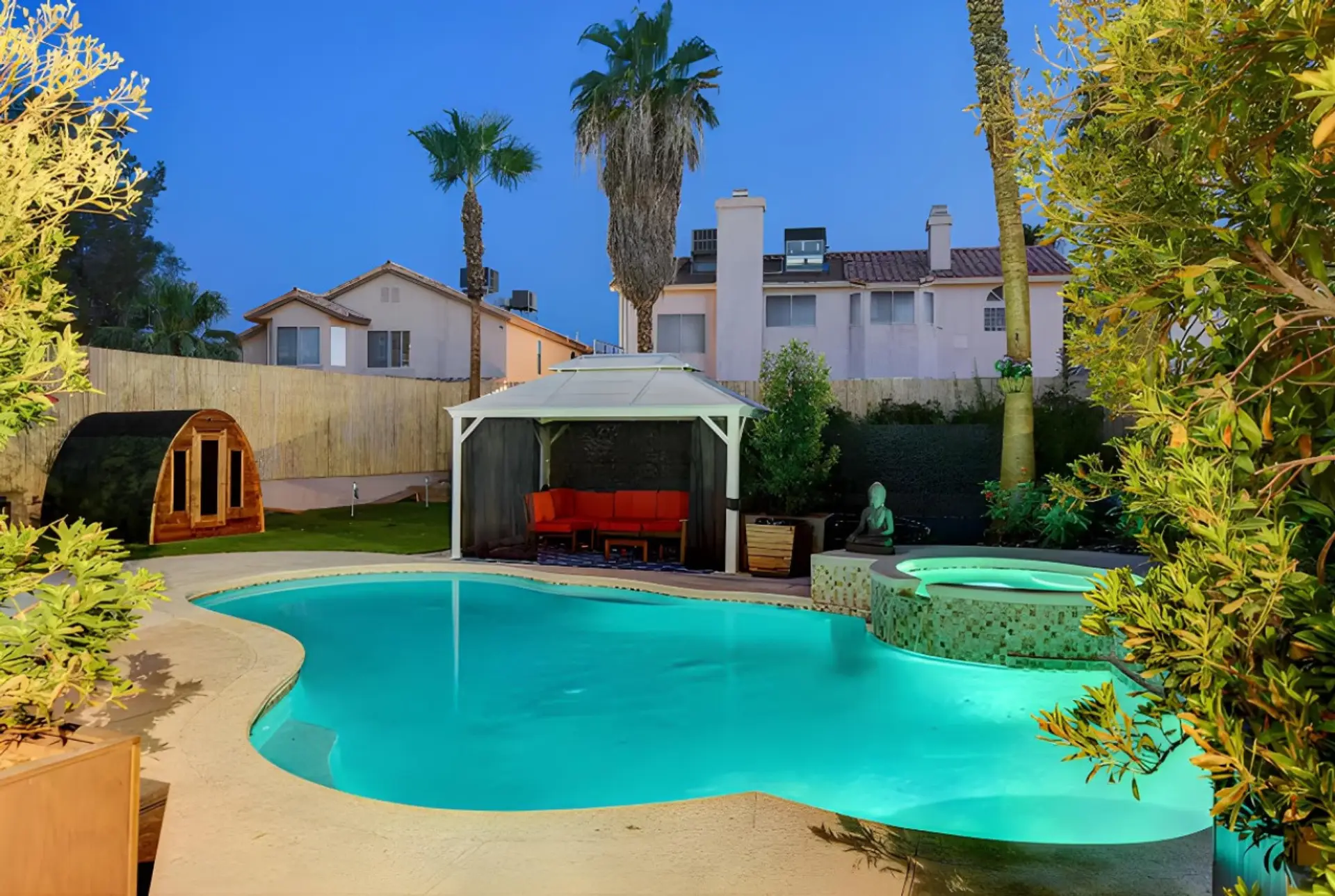Absolutely stunning back yard ( this is an older photo of the pool without the new water slide we recently added)