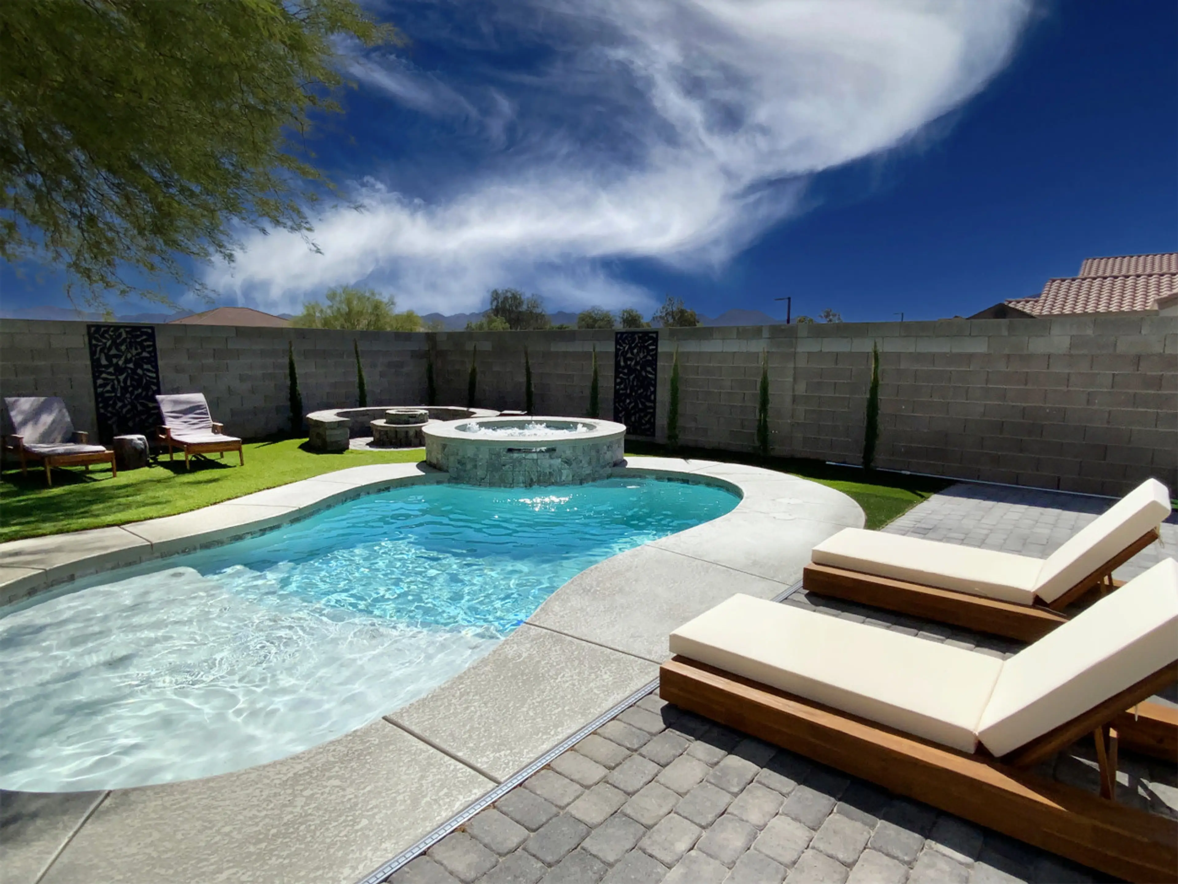 Pool, Hot tub, Fire pit, Sun beds, a back yard packed with activity