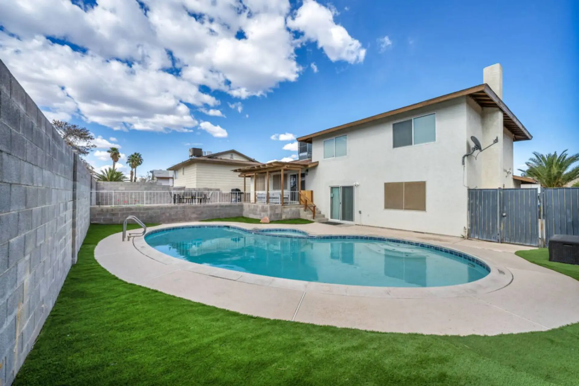 Beautiful pool and hot tub—soak up the Vegas sun in style, whether you're cooling off in the pool or relaxing in the hot tub. Pure fun in the sun!