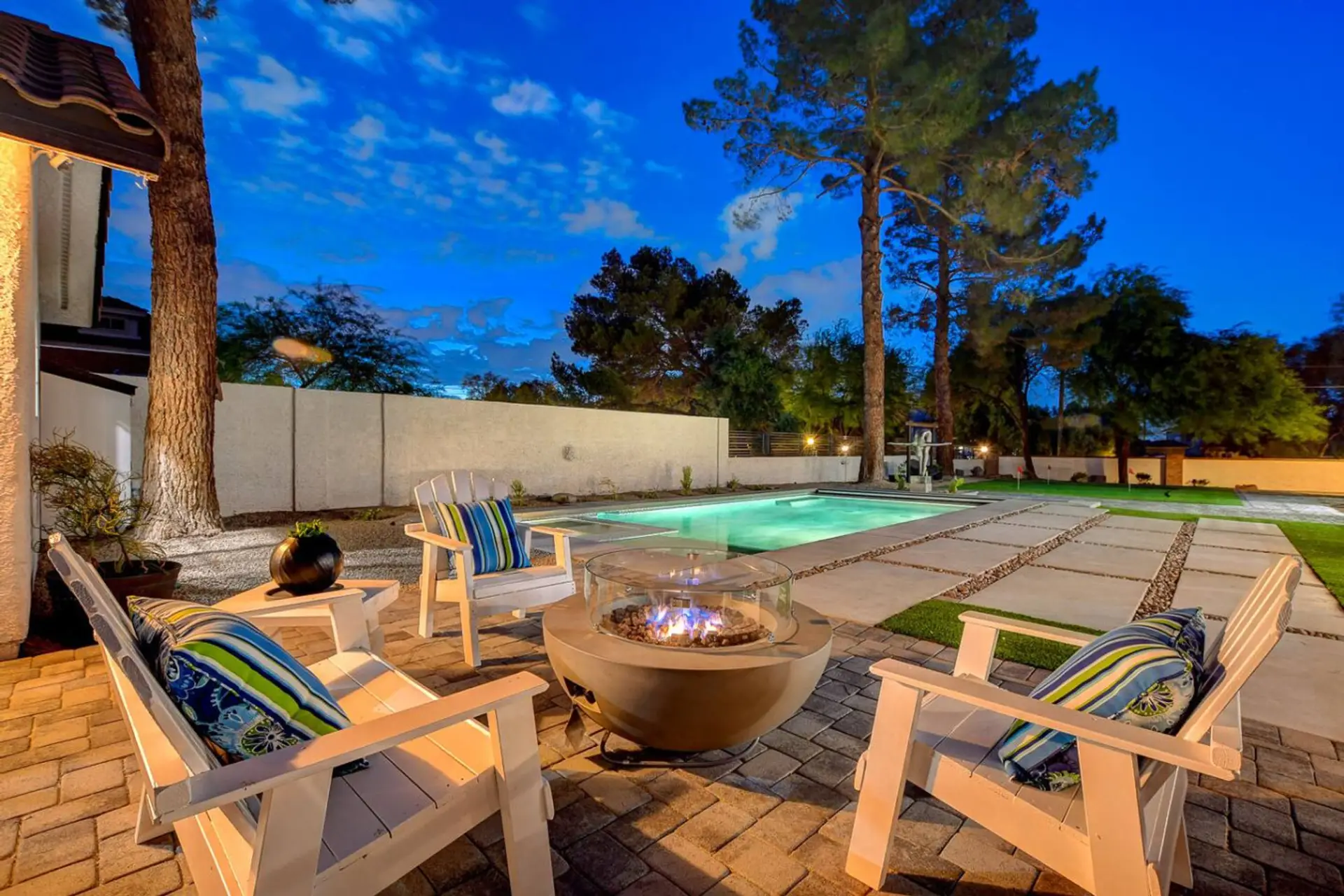 As the sun goes down, this backyard truly comes alive. Experience the perfect ambiance for winding down after a day of adventure or sharing stories under a twilight sky.