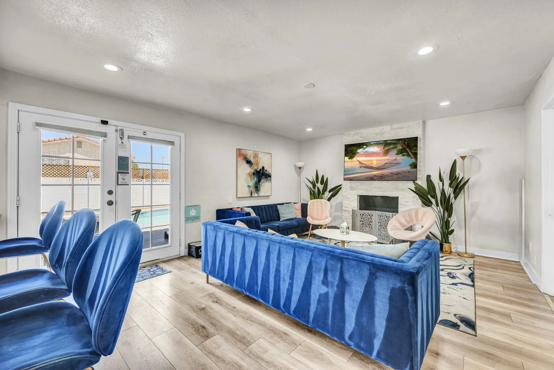 Kick back on the ultra-comfy sectional and stream your favorite shows on the big smart TV, this cheerful living room is built for movie nights, game time, and unforgettable family moments