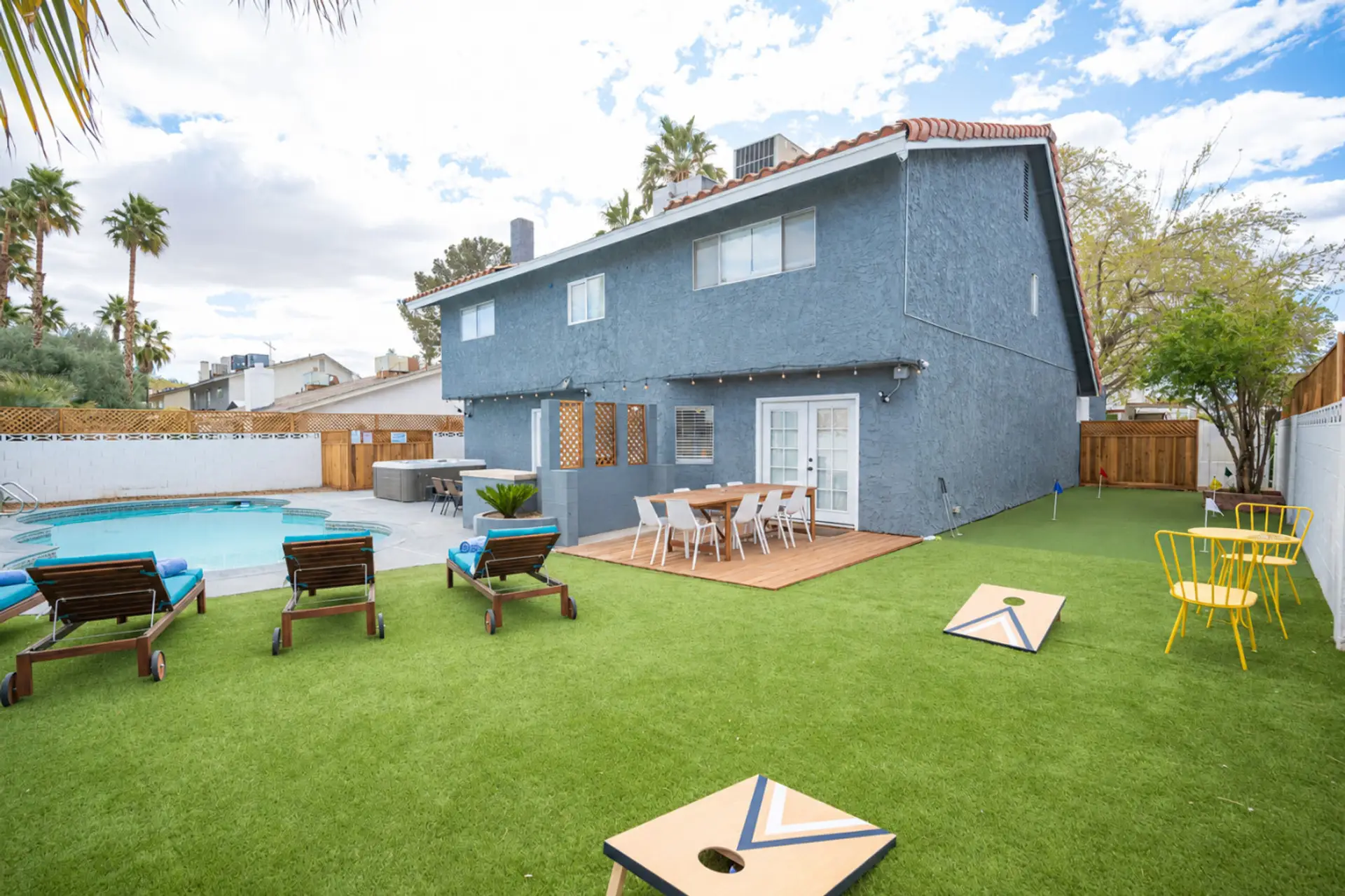 Back yard is full of surprises - Beautiful Pool, Hot tub, Mini golf, Corn Hole, BBQ Grill, Outdoor dining and more...