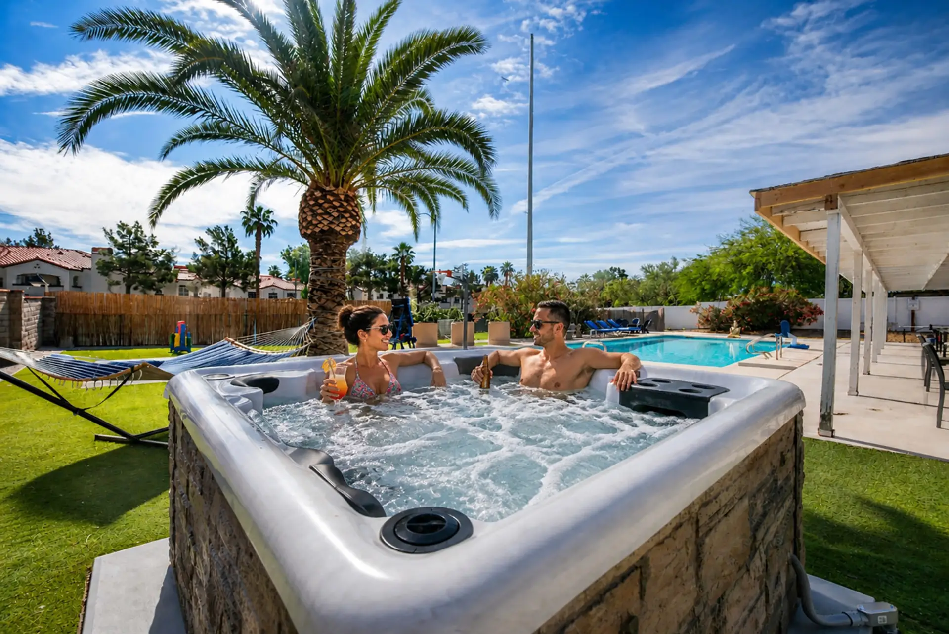 Soak under the stars in the bubbling hot tub and enjoy a perfect evening moment together after a full day of Vegas fun.