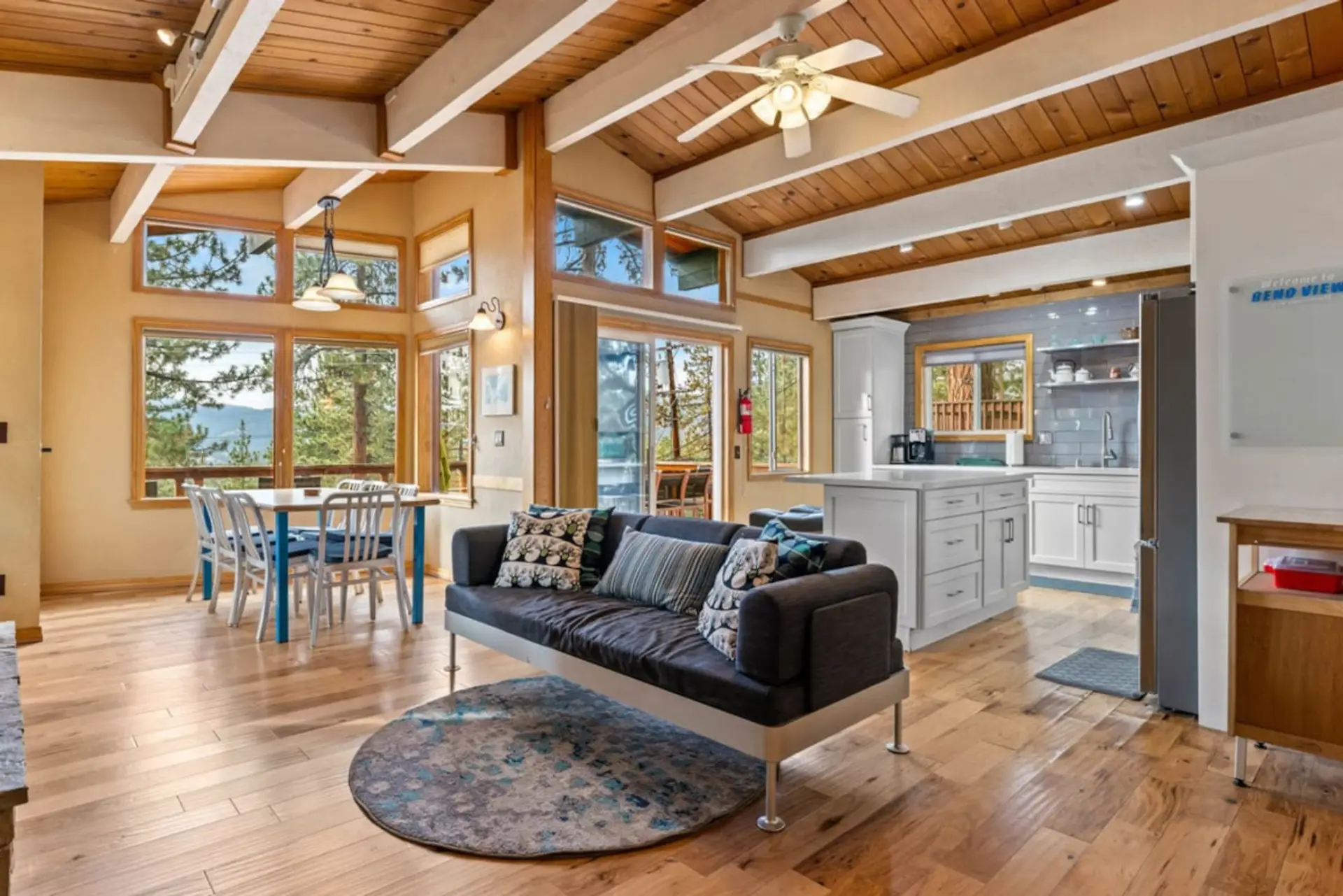 Upstairs living room with open access to the kitchen and dining areas