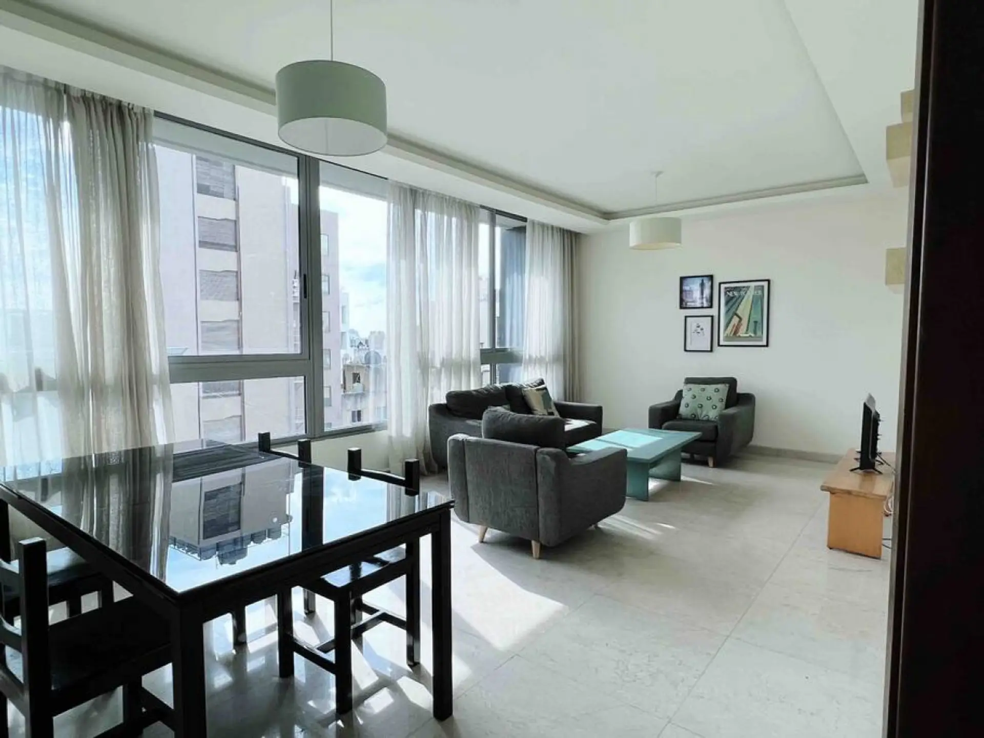 Gather together in a beautifully lit common area offering both style and everyday functionality.