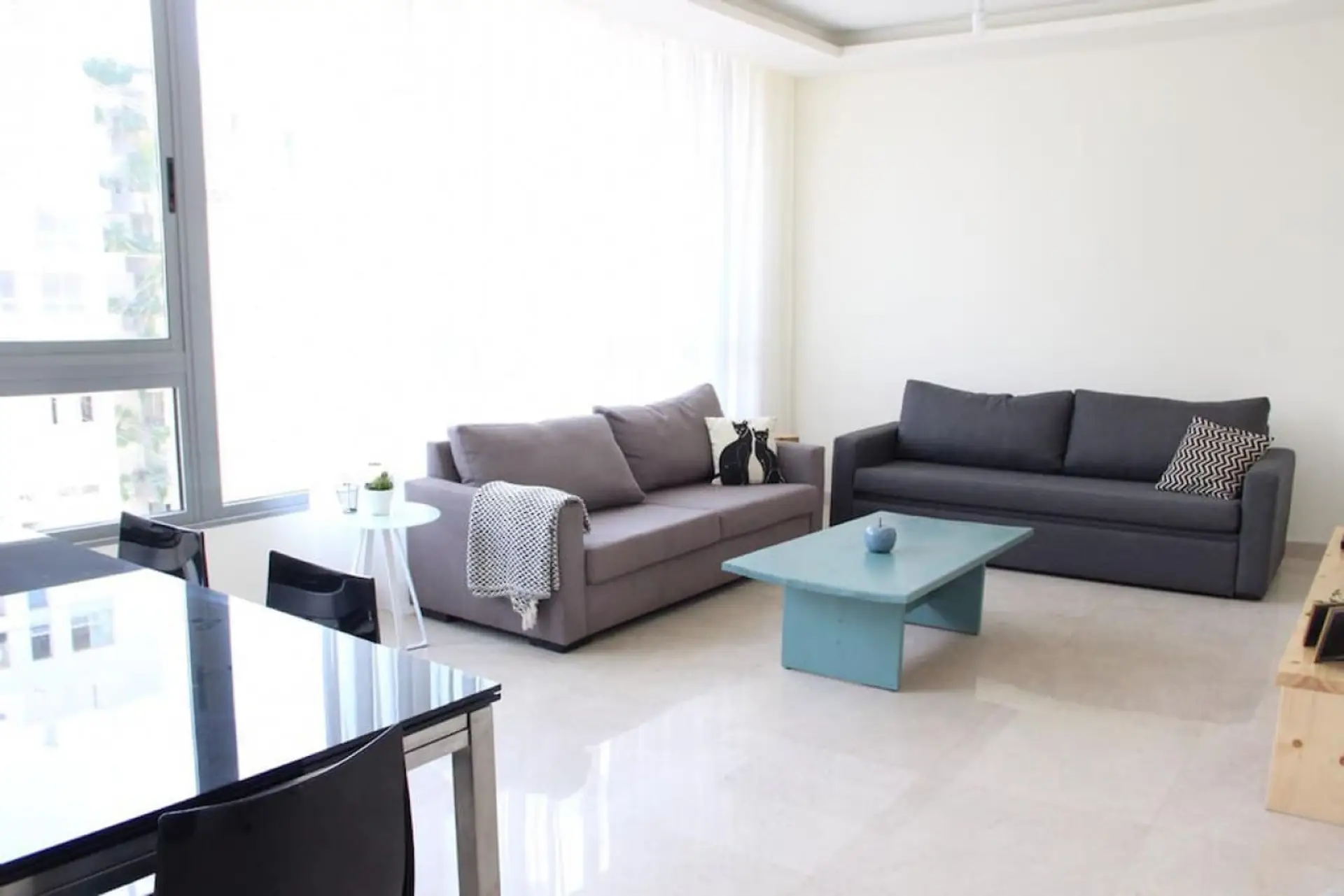 Contemporary comfort meets timeless simplicity in this beautifully appointed lounge.