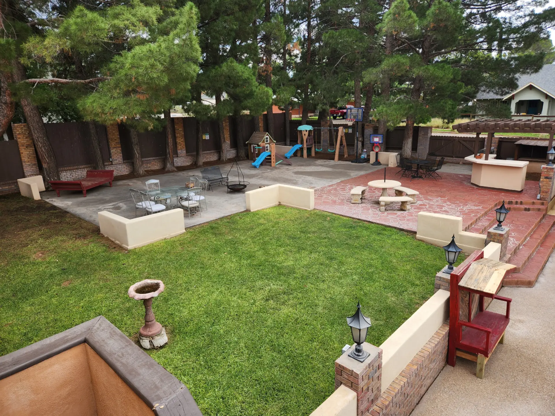 Patio w/ enclosed yard and kids' area
