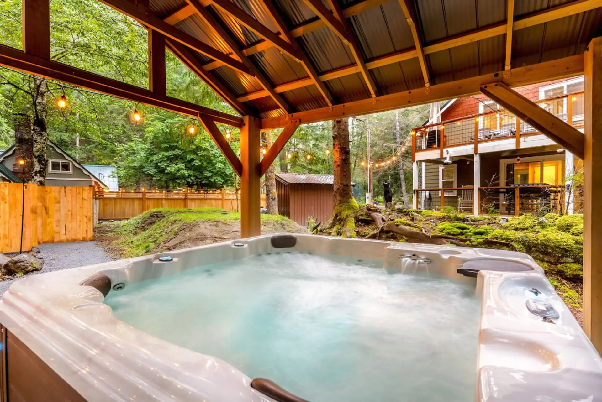 Relaxing, Covered 6-Person hot tub in the backyard!  Soak after a day on the trails!