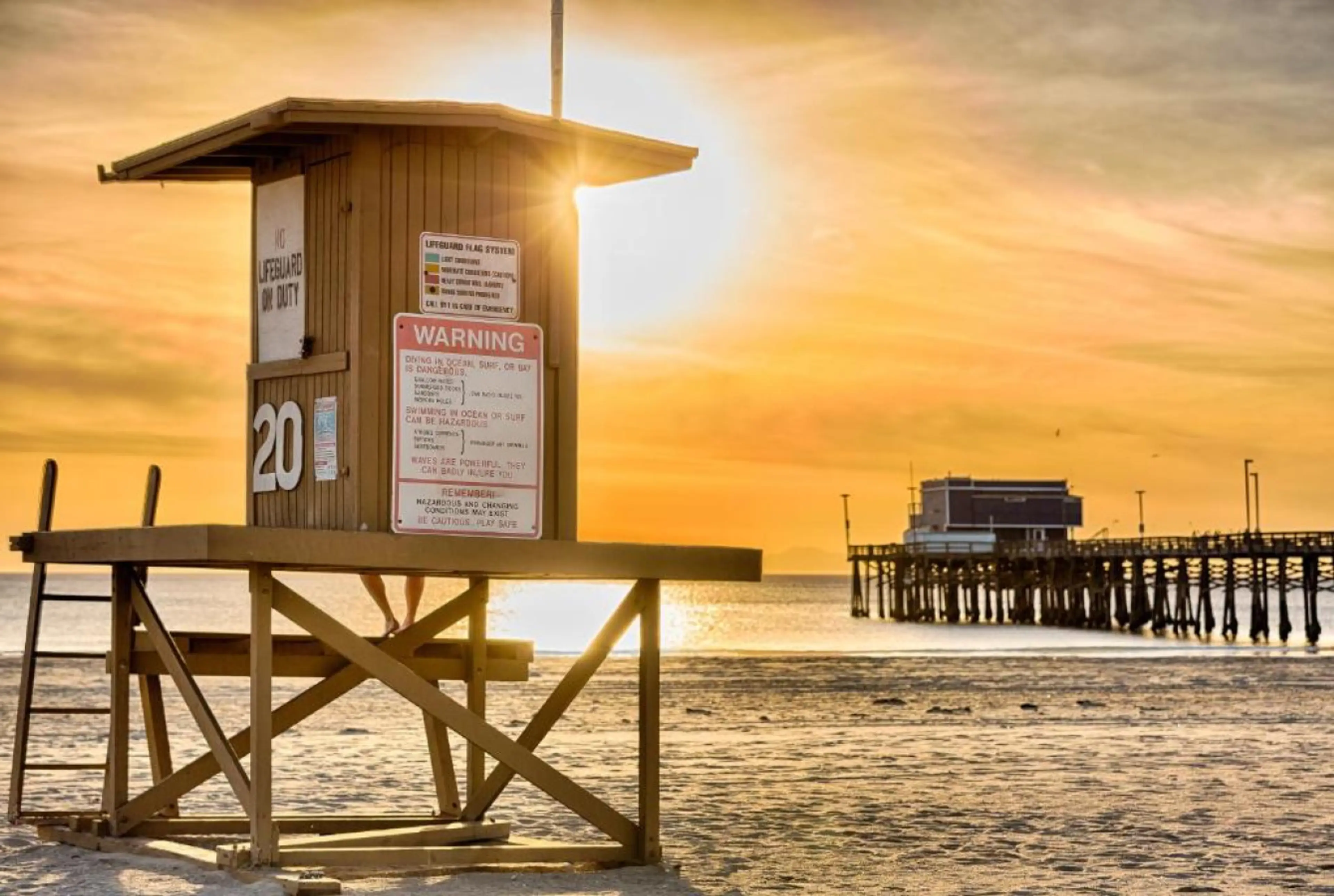 Your daily sunset walk. The iconic 20th St. Lifeguard Tower and Newport Pier are just steps from your front door.