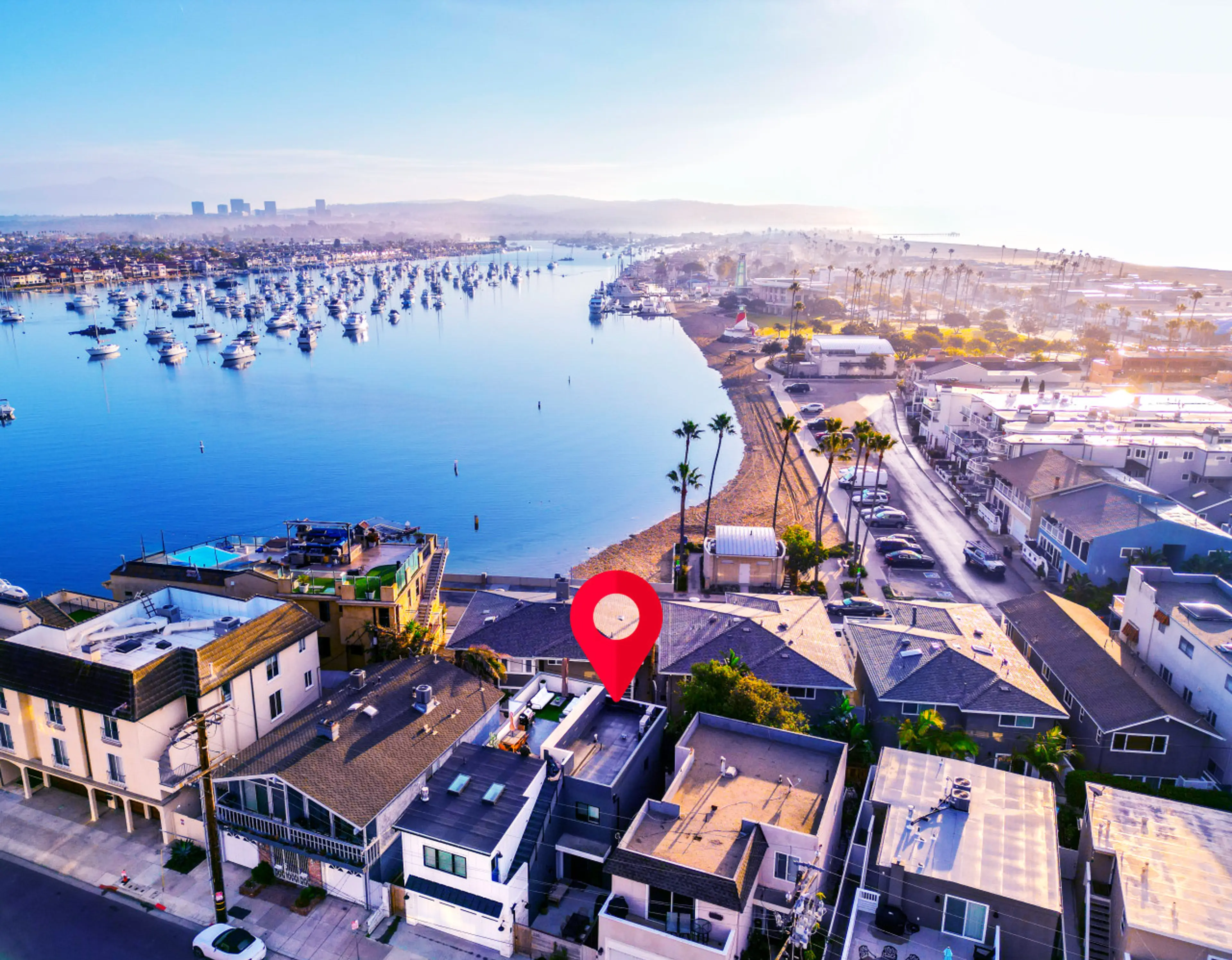 The perfect 'Goldilocks' location: We are nestled on a quiet residential street next to the peaceful harbor (Marina Park), yet just a 2-minute stroll to the vibrant Pier and beach action.
