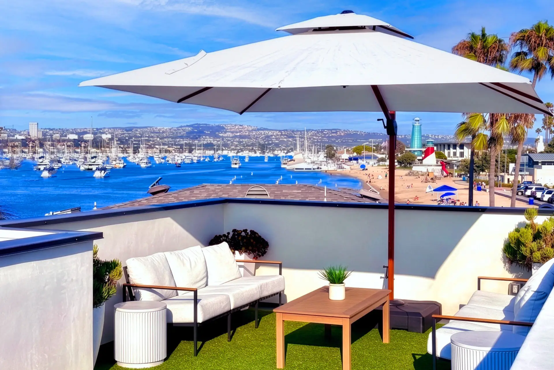 Experience the best views in the neighborhood from your own private rooftop oasis. This space is designed with lounge seating and a large umbrella for shade, it’s the perfect spot to soak in the coastal breeze.