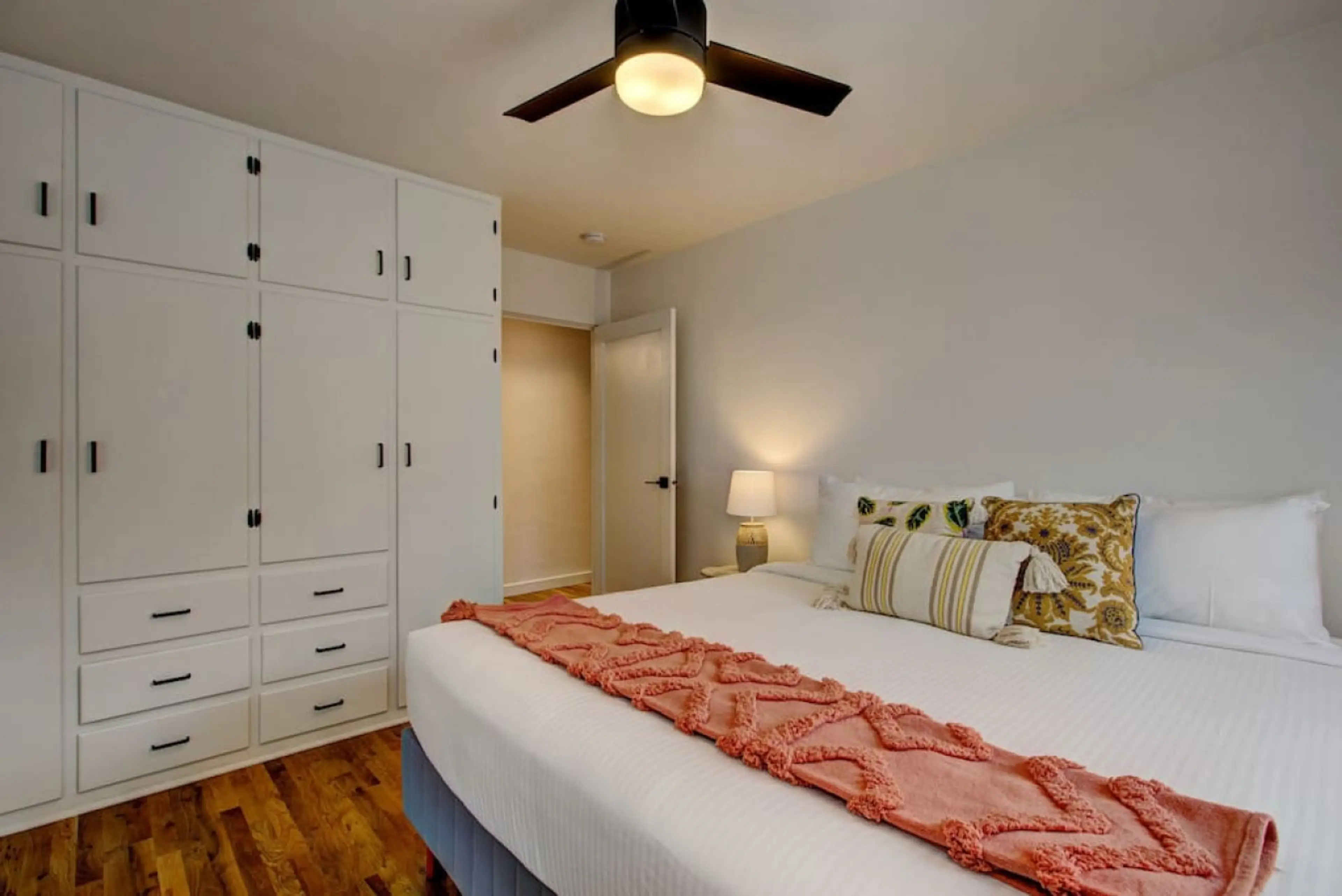 Bedroom with king bed and closets