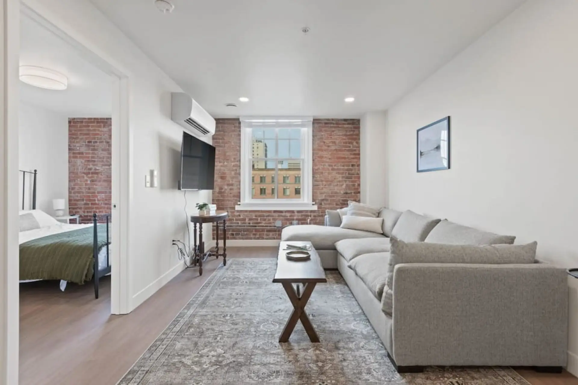 Relax in style—cozy seating with curated art and design accents.