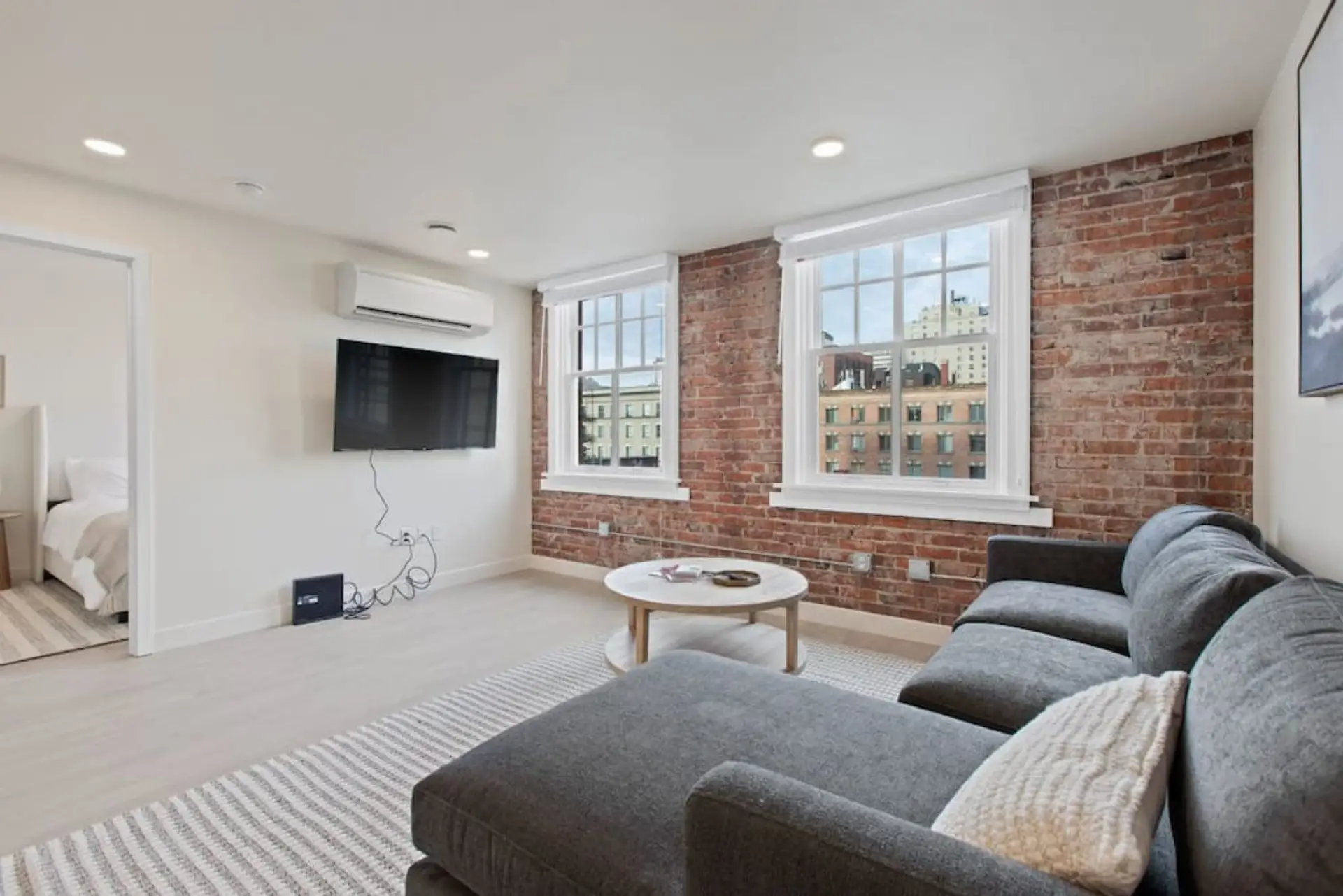 Relax in style—cozy seating with curated art and design accents.